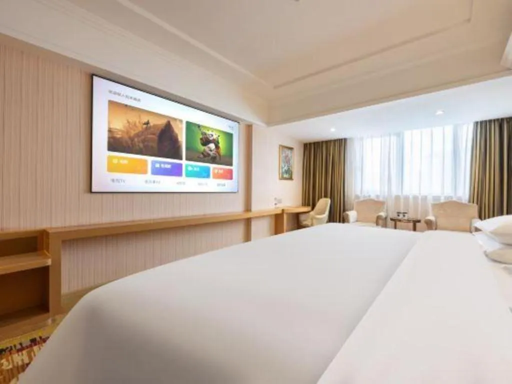 Bed in Vienna Hotel Guangzhou Baiyun Airport Huadu Avenue
