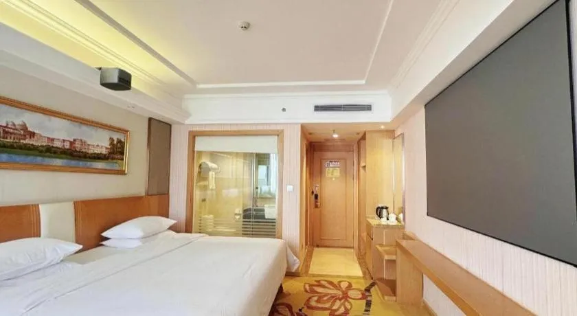 Bed in Vienna Hotel Guangzhou Baiyun Airport Huadu Avenue