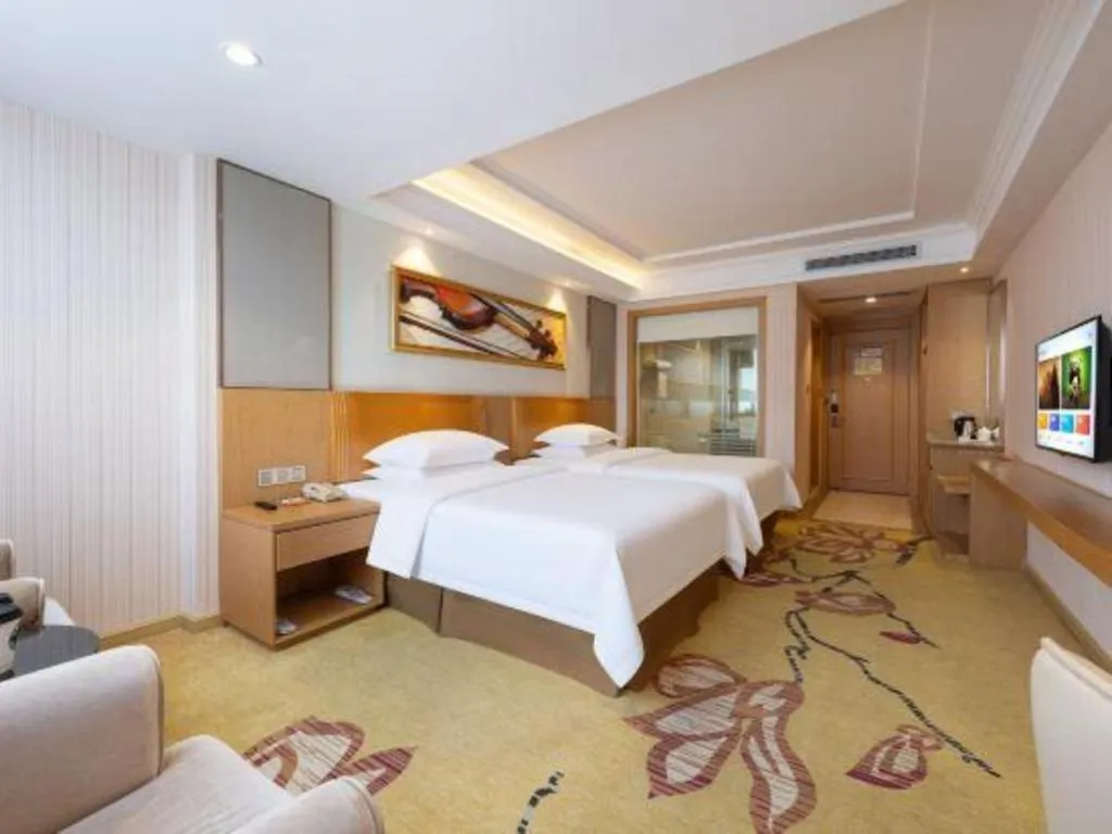 Bed in Vienna Hotel Guangzhou Baiyun Airport Huadu Avenue