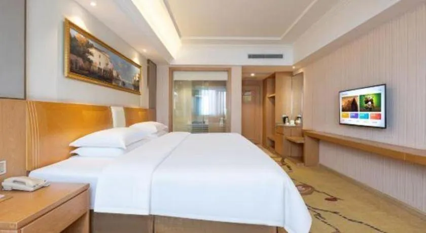 Bed in Vienna Hotel Guangzhou Baiyun Airport Huadu Avenue