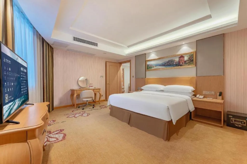 Bed in Vienna Hotel Guangzhou Baiyun Airport Huadu Avenue