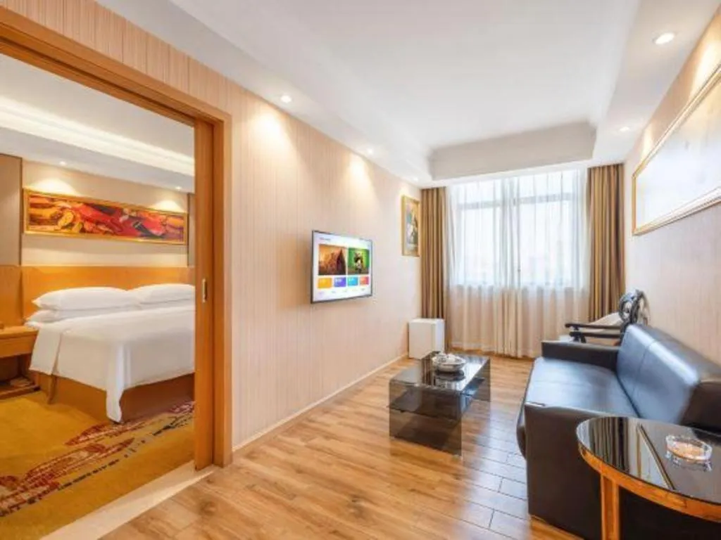 Bed in Vienna Hotel Guangzhou Baiyun Airport Huadu Avenue