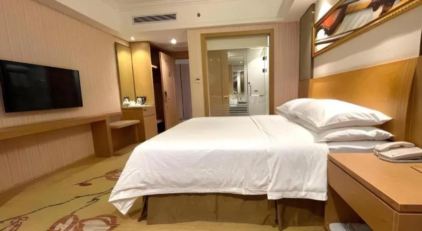 Bed in Vienna Hotel Guangzhou Baiyun Airport Huadu Avenue