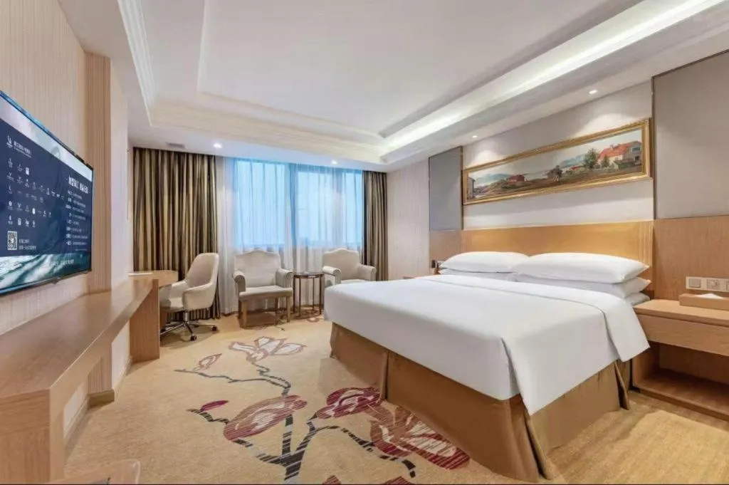 Bed in Vienna Hotel Guangzhou Baiyun Airport Huadu Avenue