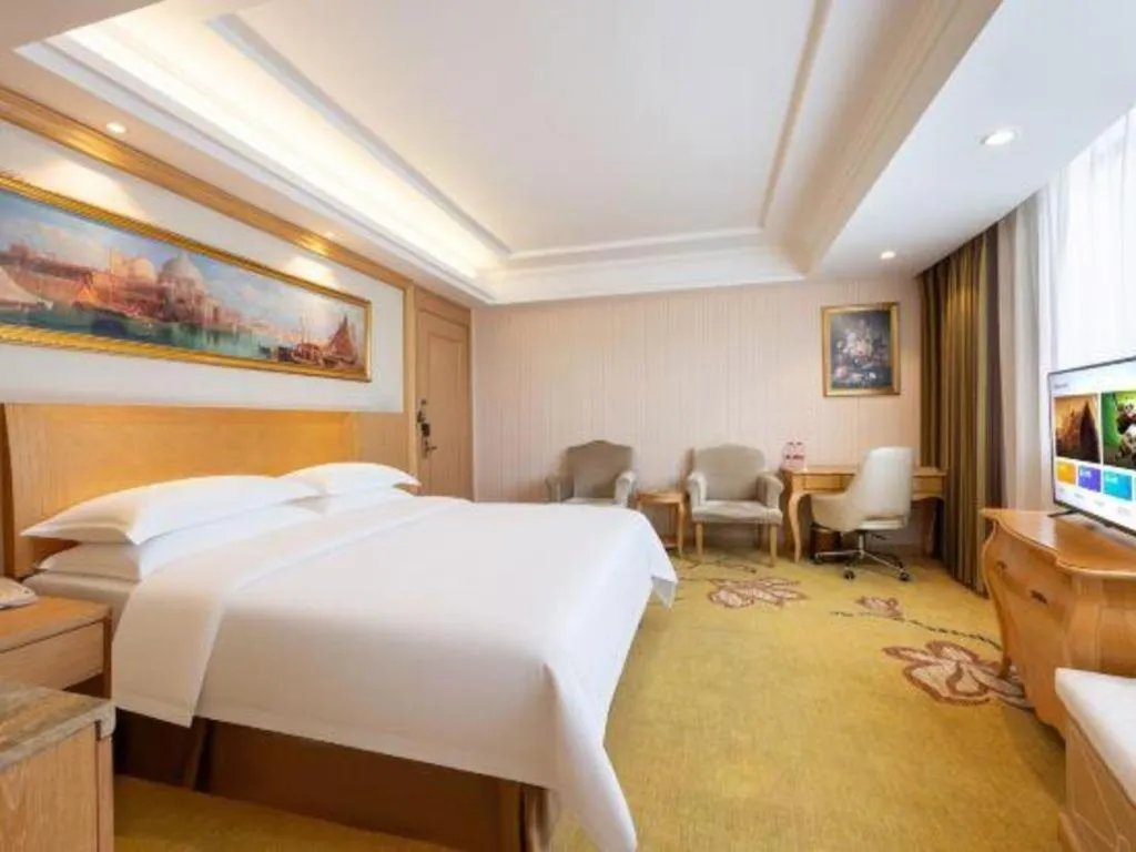 Bed in Vienna Hotel Guangzhou Baiyun Airport Huadu Avenue