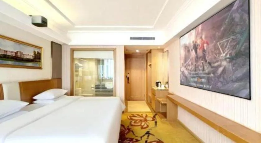 Bed in Vienna Hotel Guangzhou Baiyun Airport Huadu Avenue