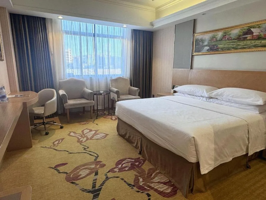 Bed in Vienna Hotel Guangzhou Baiyun Airport Huadu Avenue