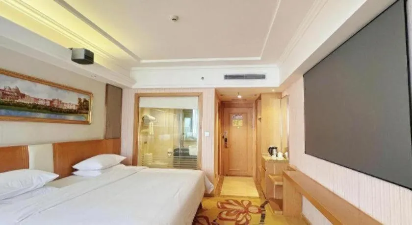 Bed in Vienna Hotel Guangzhou Baiyun Airport Huadu Avenue