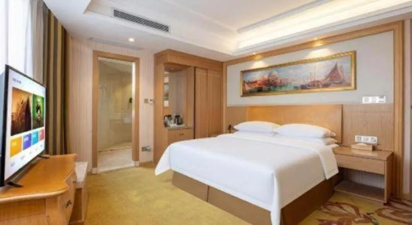 Bed in Vienna Hotel Guangzhou Baiyun Airport Huadu Avenue