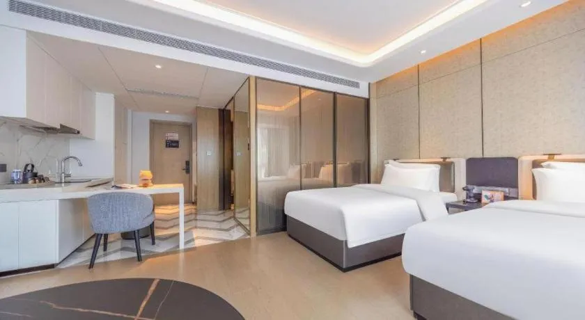 Bed in Shenzhen Cloud Park Manhattan Hotel