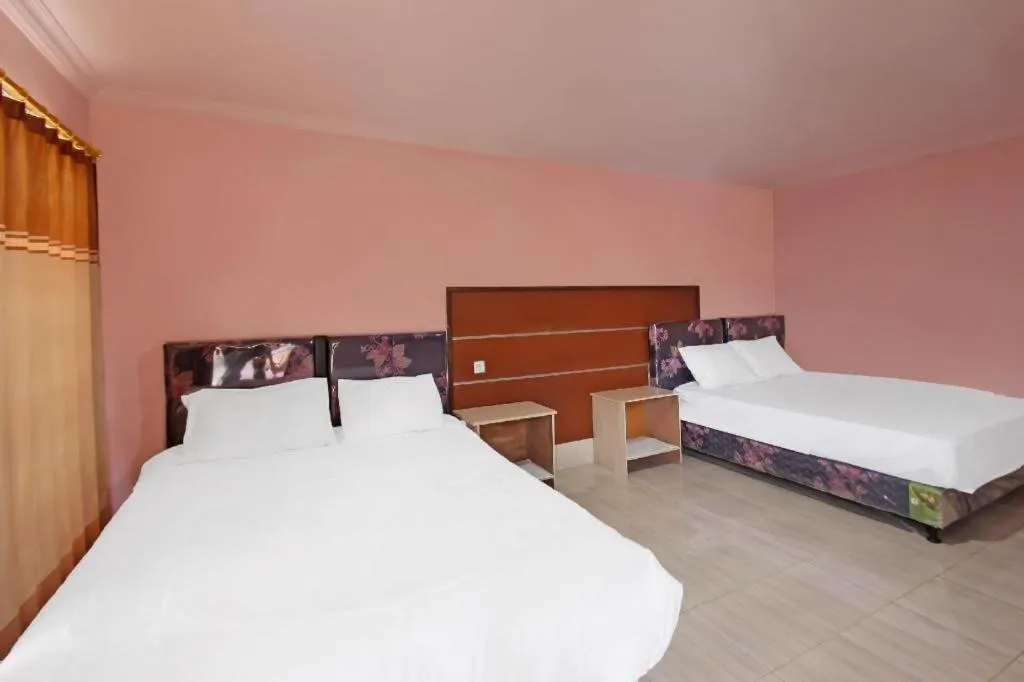 Bed in OYO 91744 Hotel Gemilang