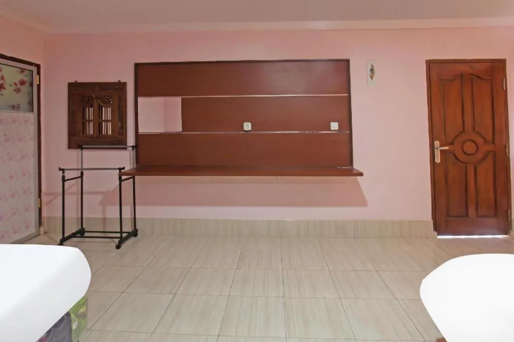 Bed in OYO 91744 Hotel Gemilang