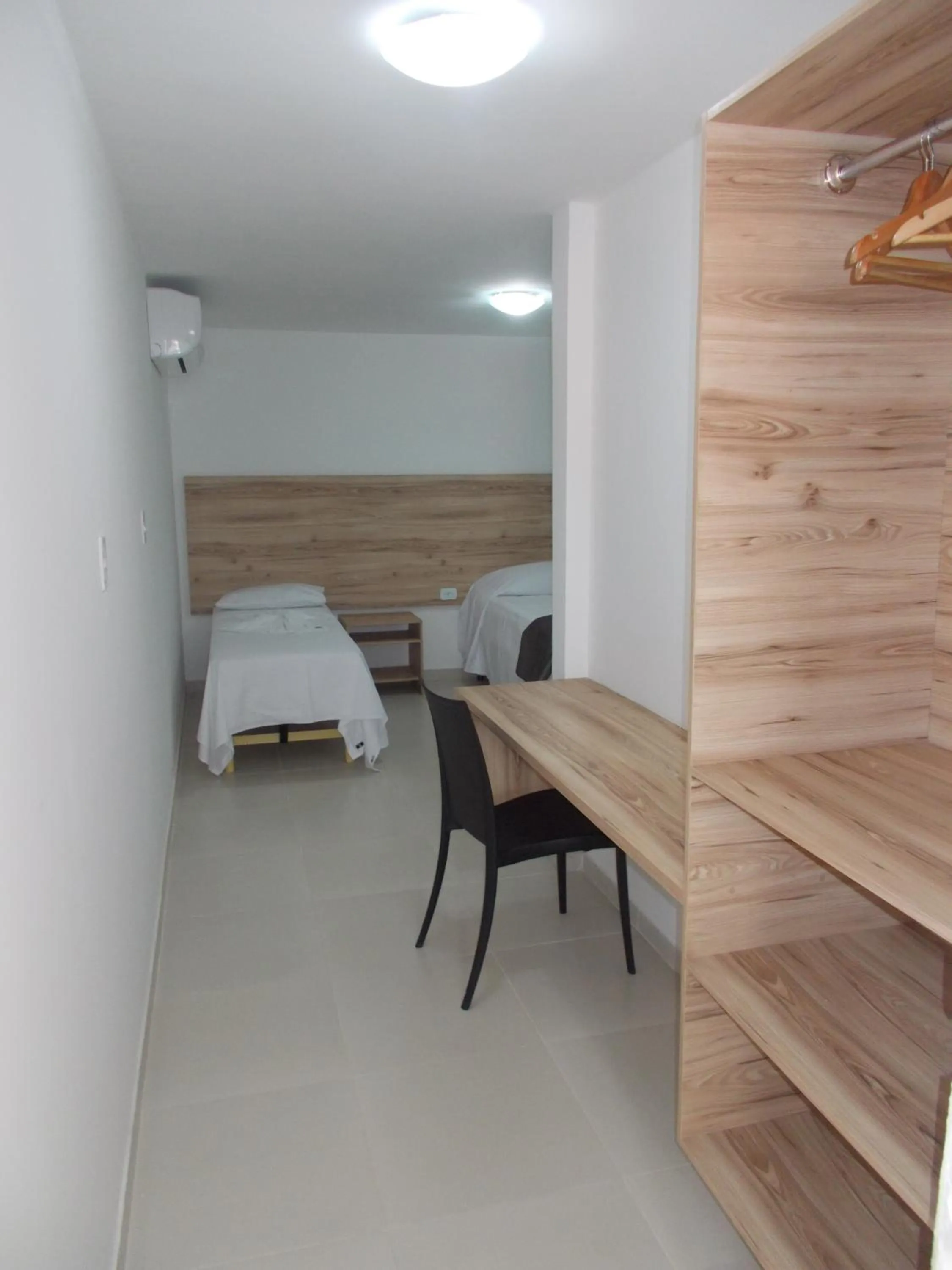 Living room, Bed in Hotel Refugio