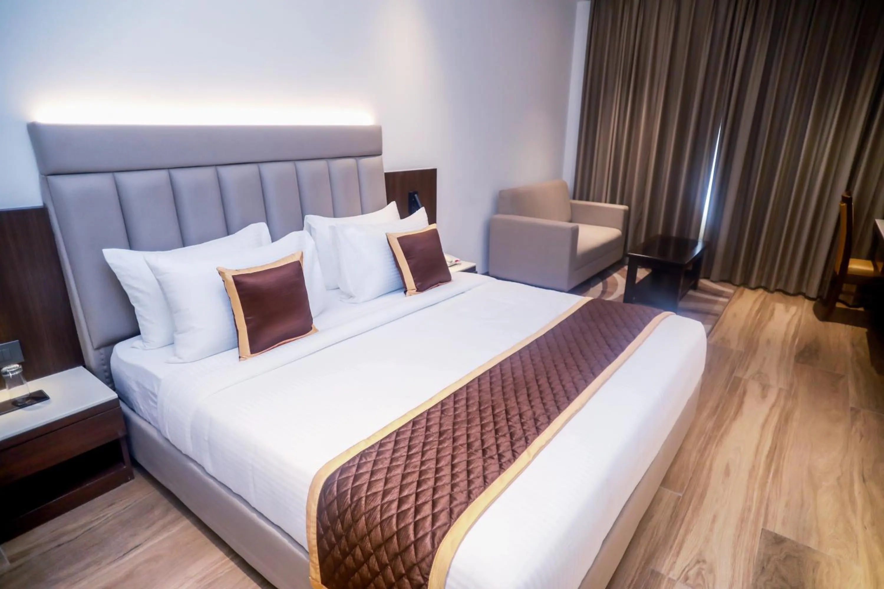 View (from property/room), Bed in Regenta Place Gwalior