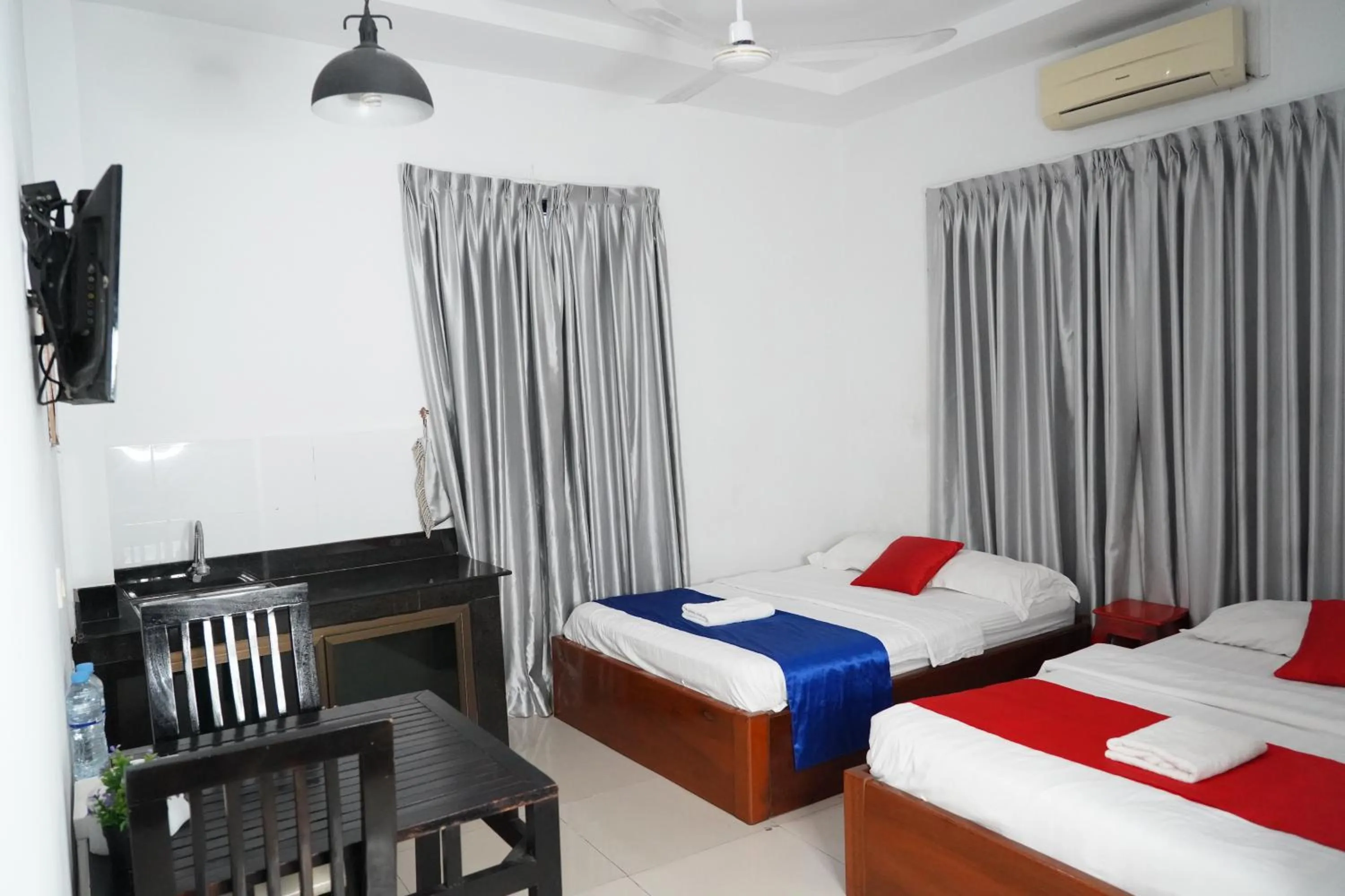 Bed in New Season Riverside Hotel