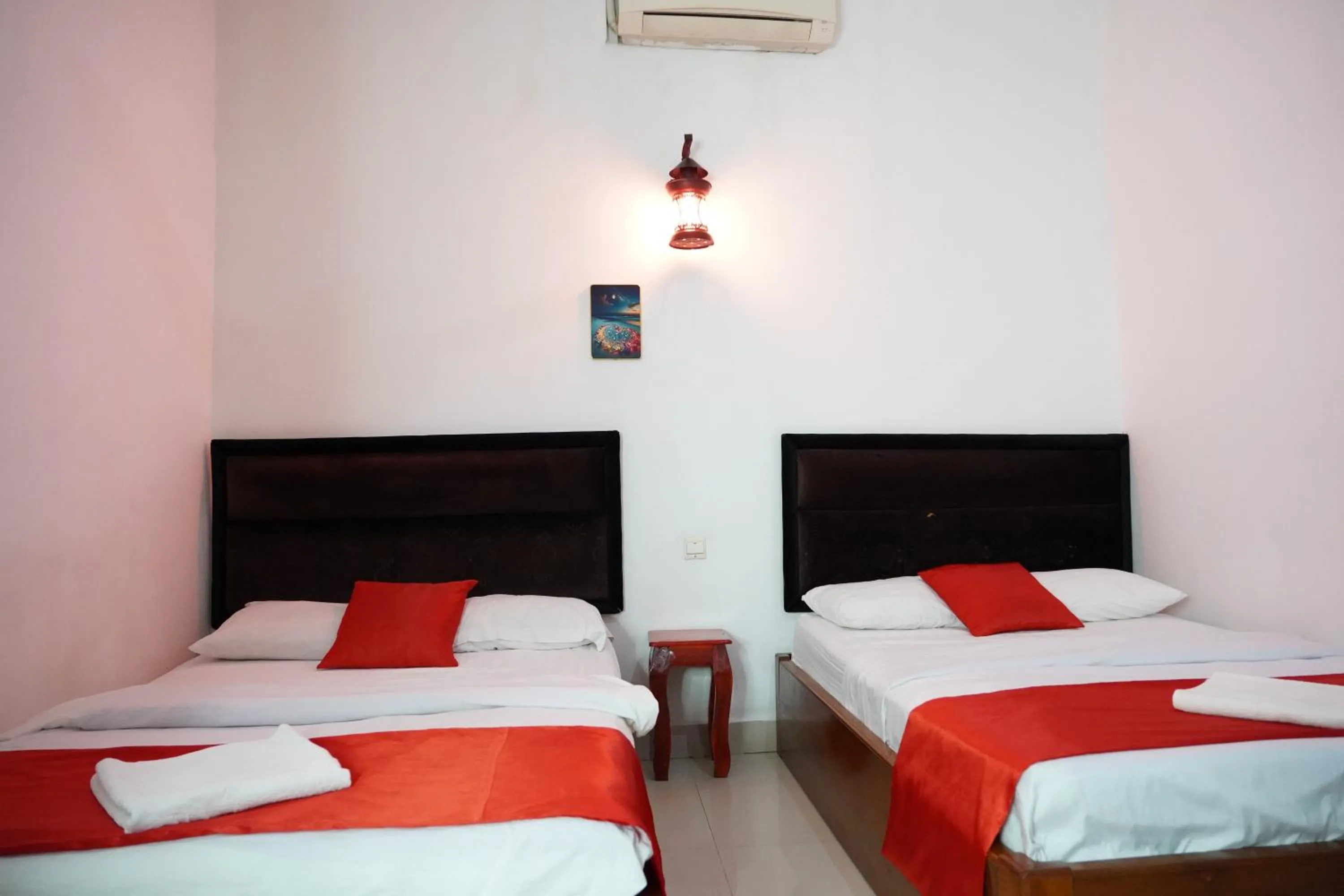 Bed in New Season Riverside Hotel