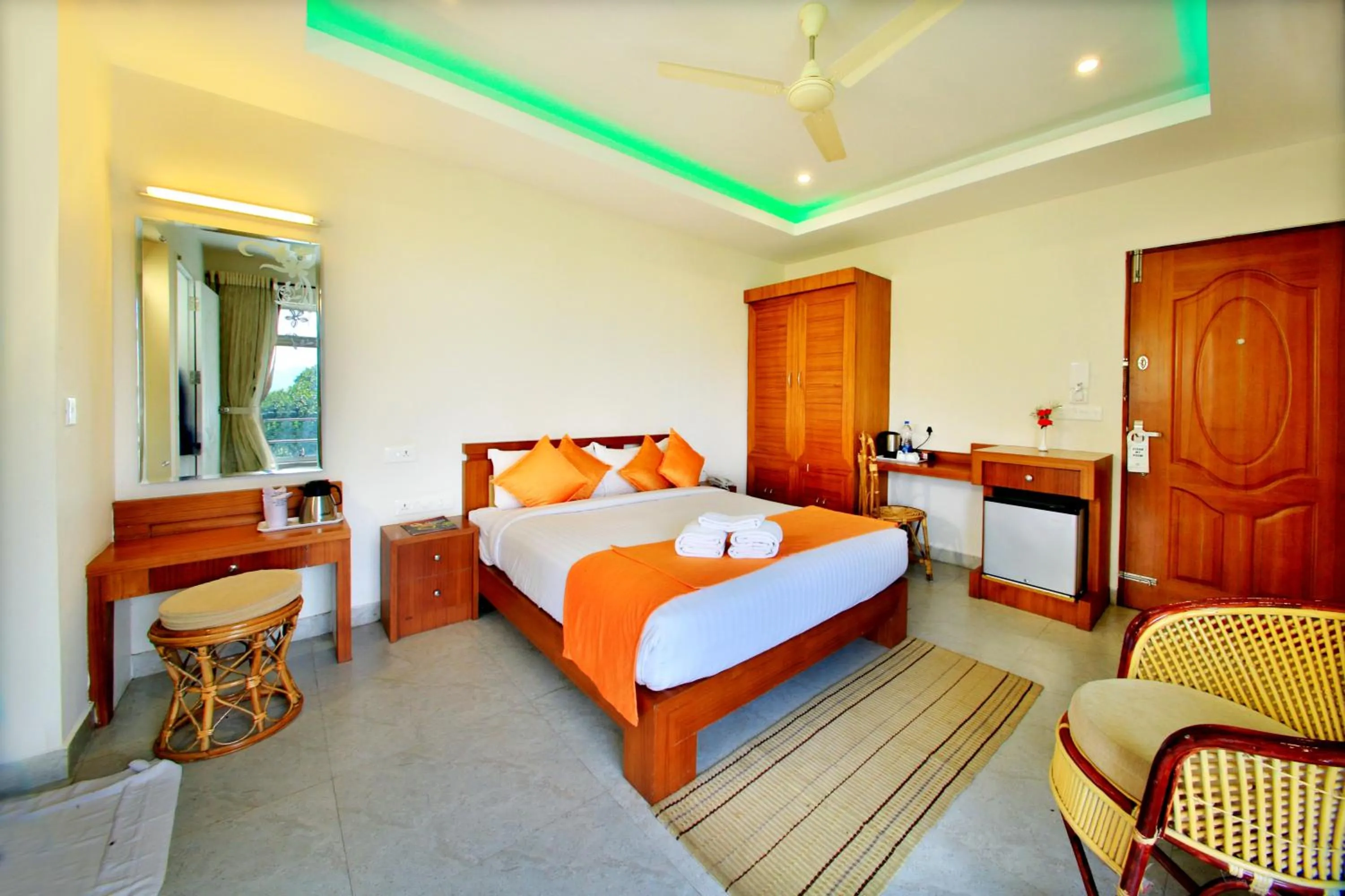 Photo of the whole room, Bed in Monsoon Grande