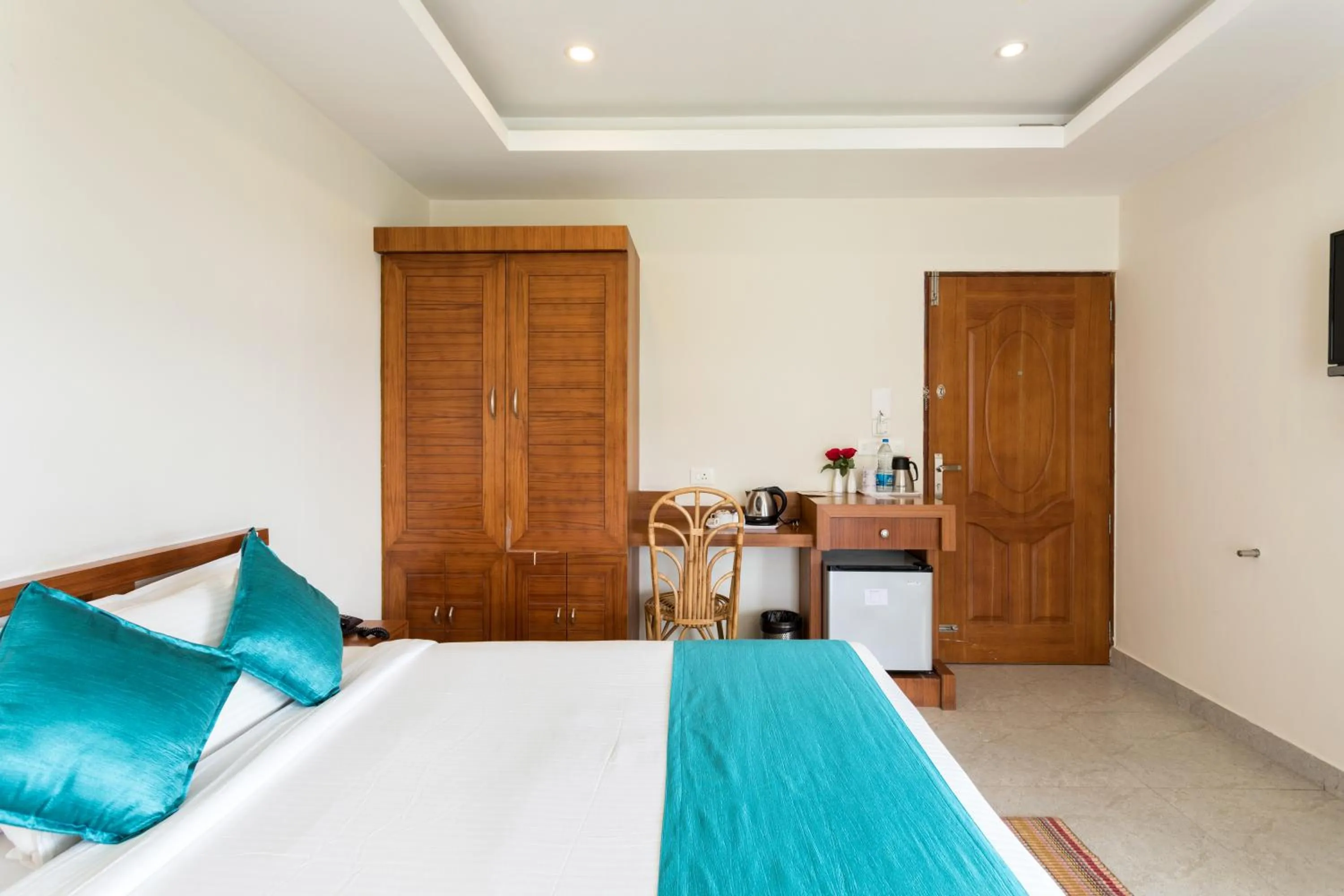 Photo of the whole room, Bed in Monsoon Grande