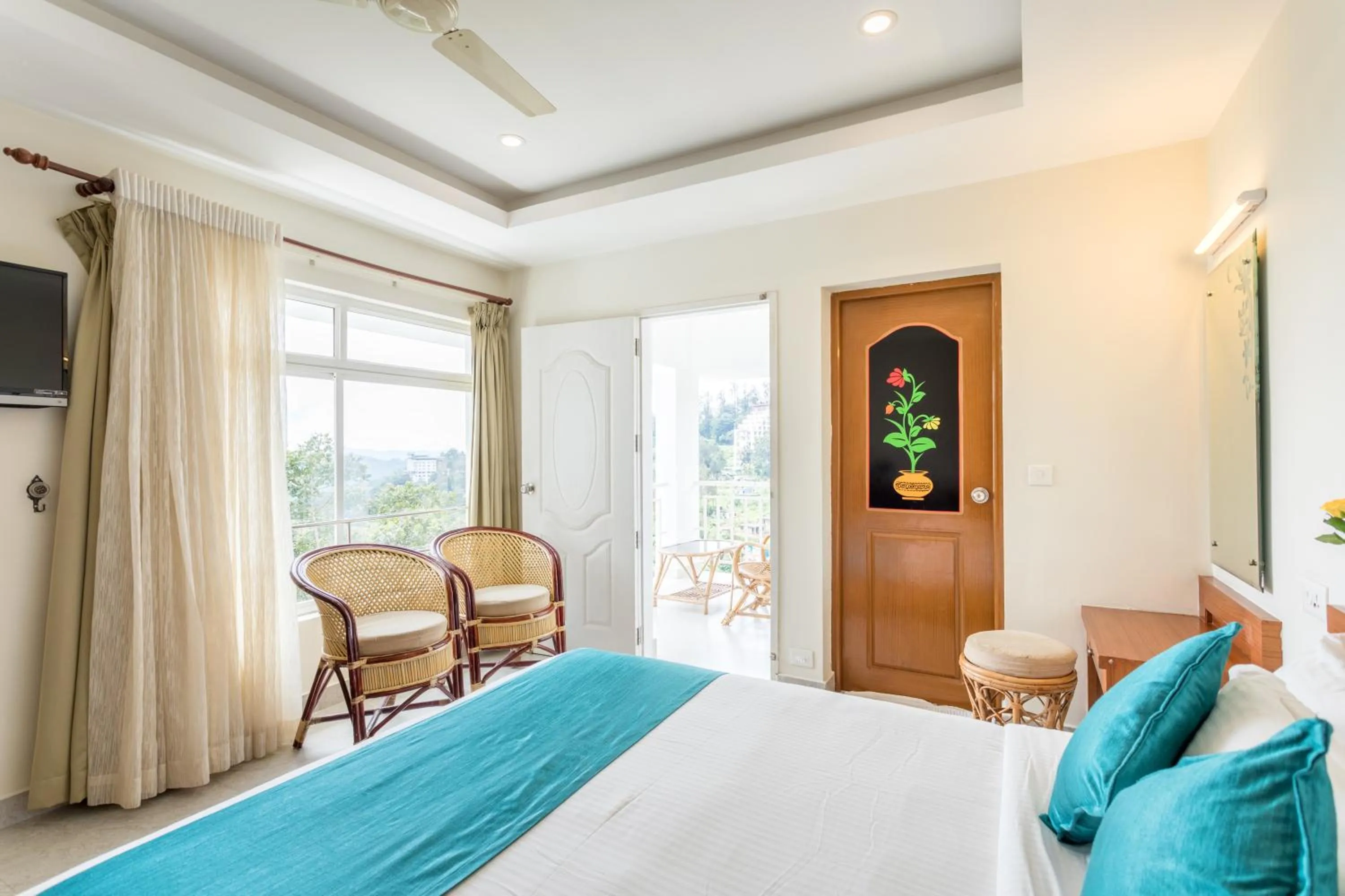 Photo of the whole room, Bed in Monsoon Grande