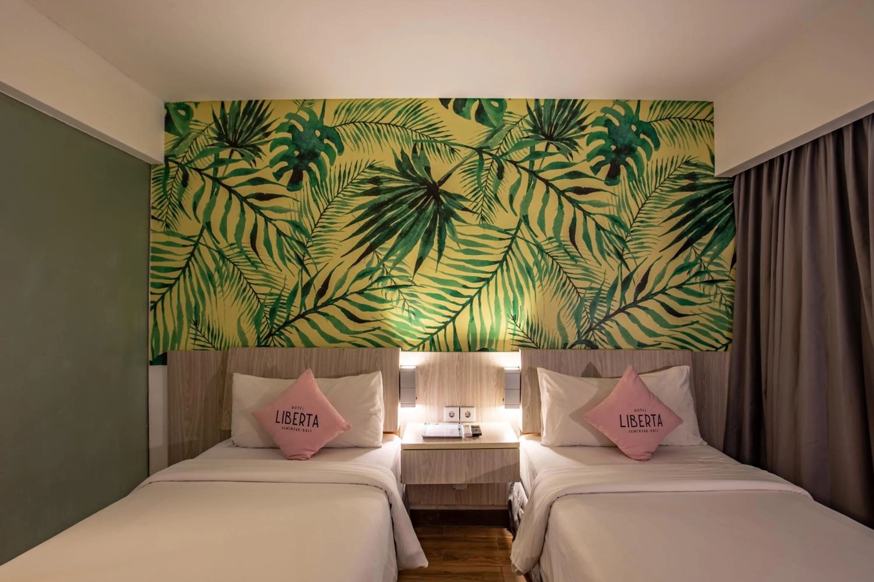 Bed in Liberta Seminyak Hotel