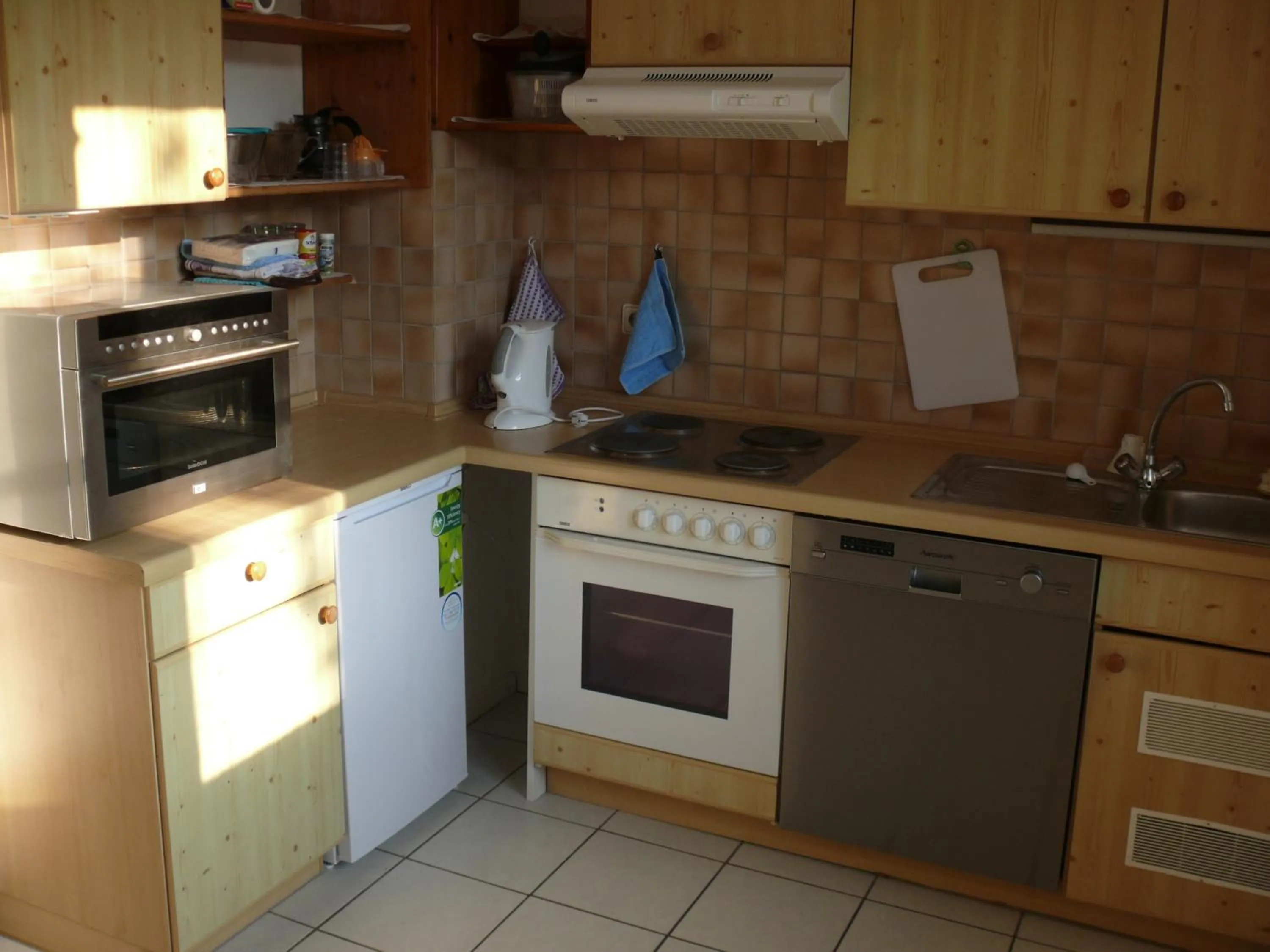 Kitchen or kitchenette in Apartments Weisser Reiter