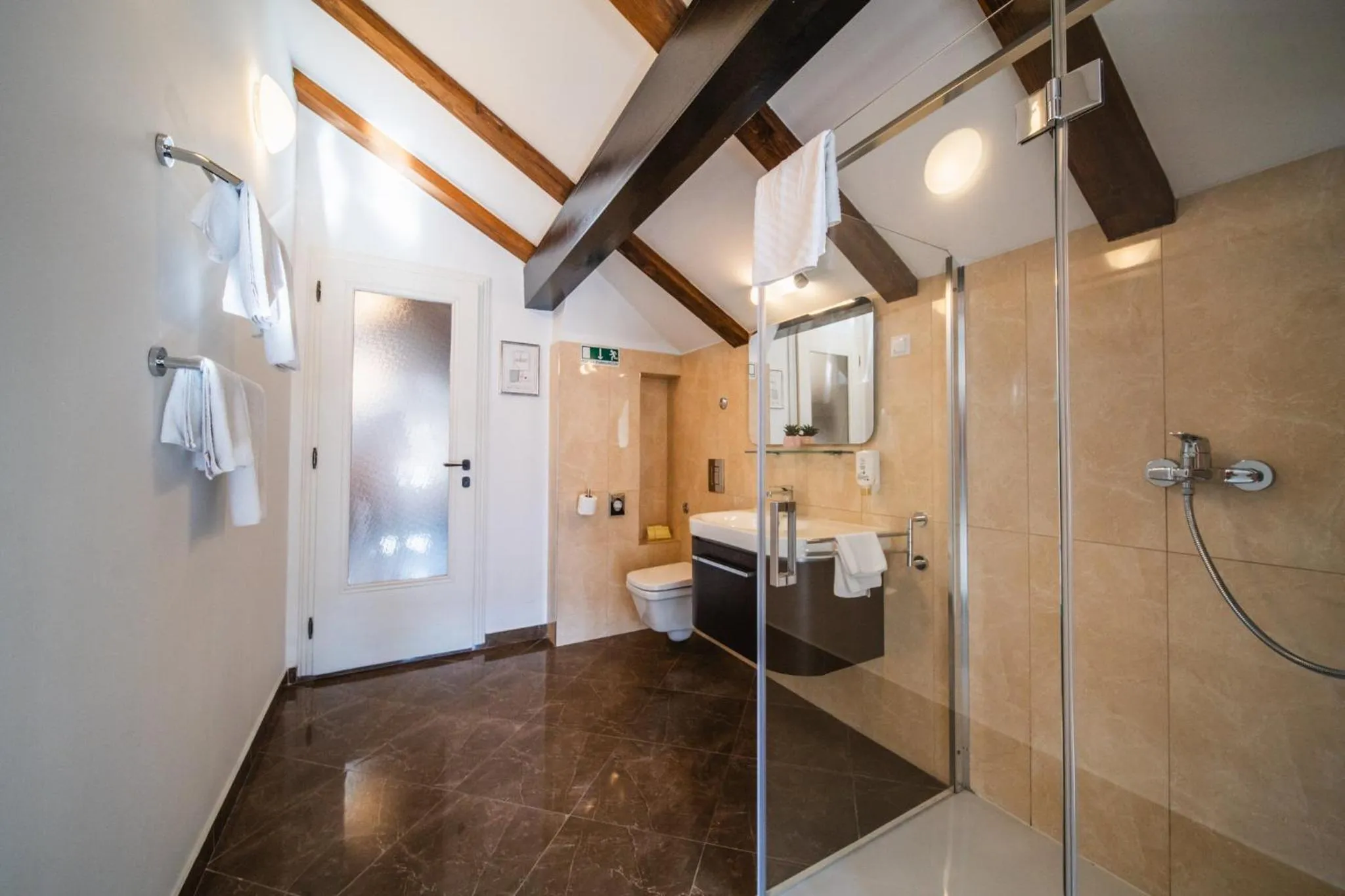 Shower in SUNce Palace Apartments with free offsite parking