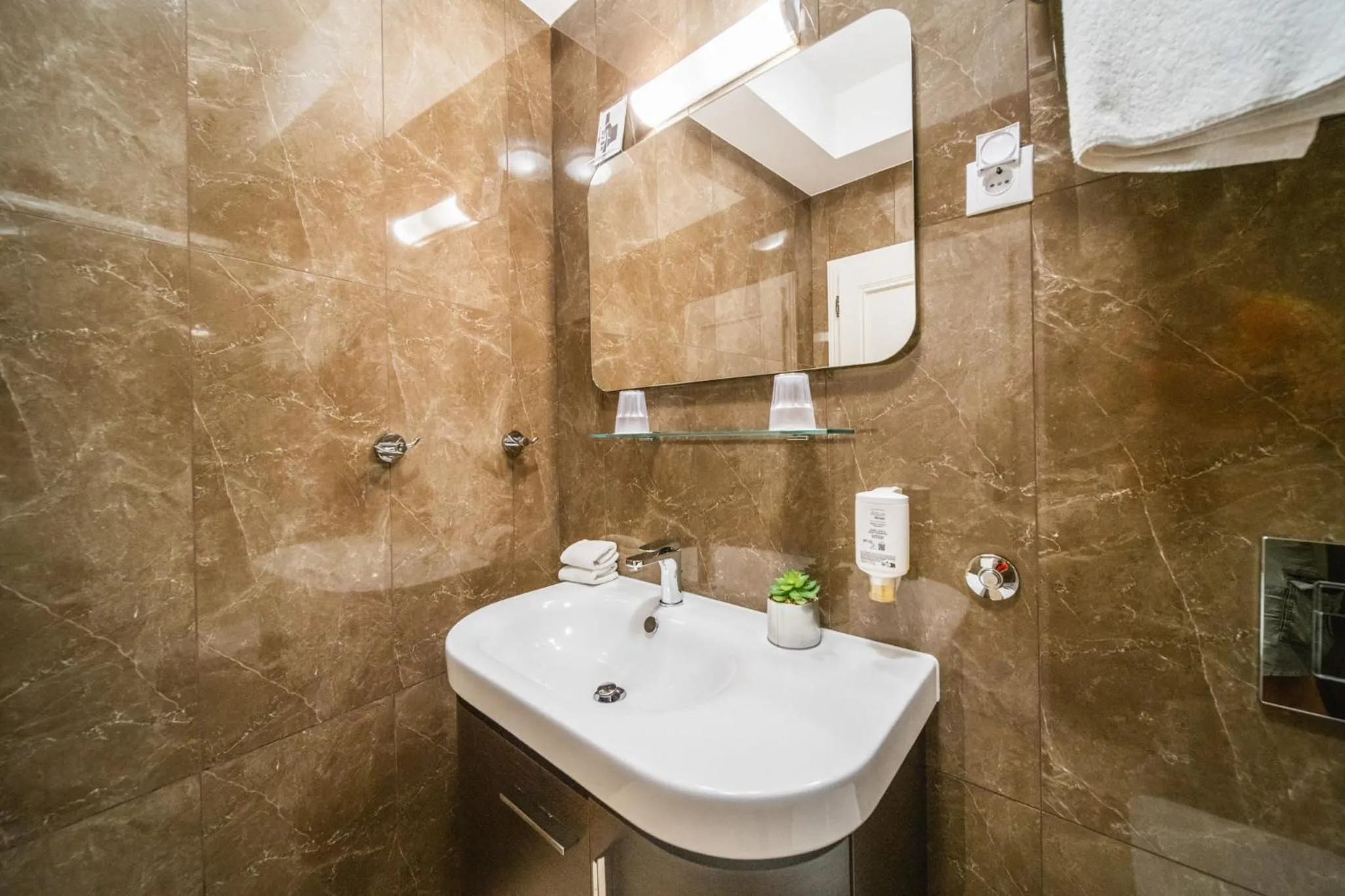 Bathroom in SUNce Palace Apartments with free offsite parking
