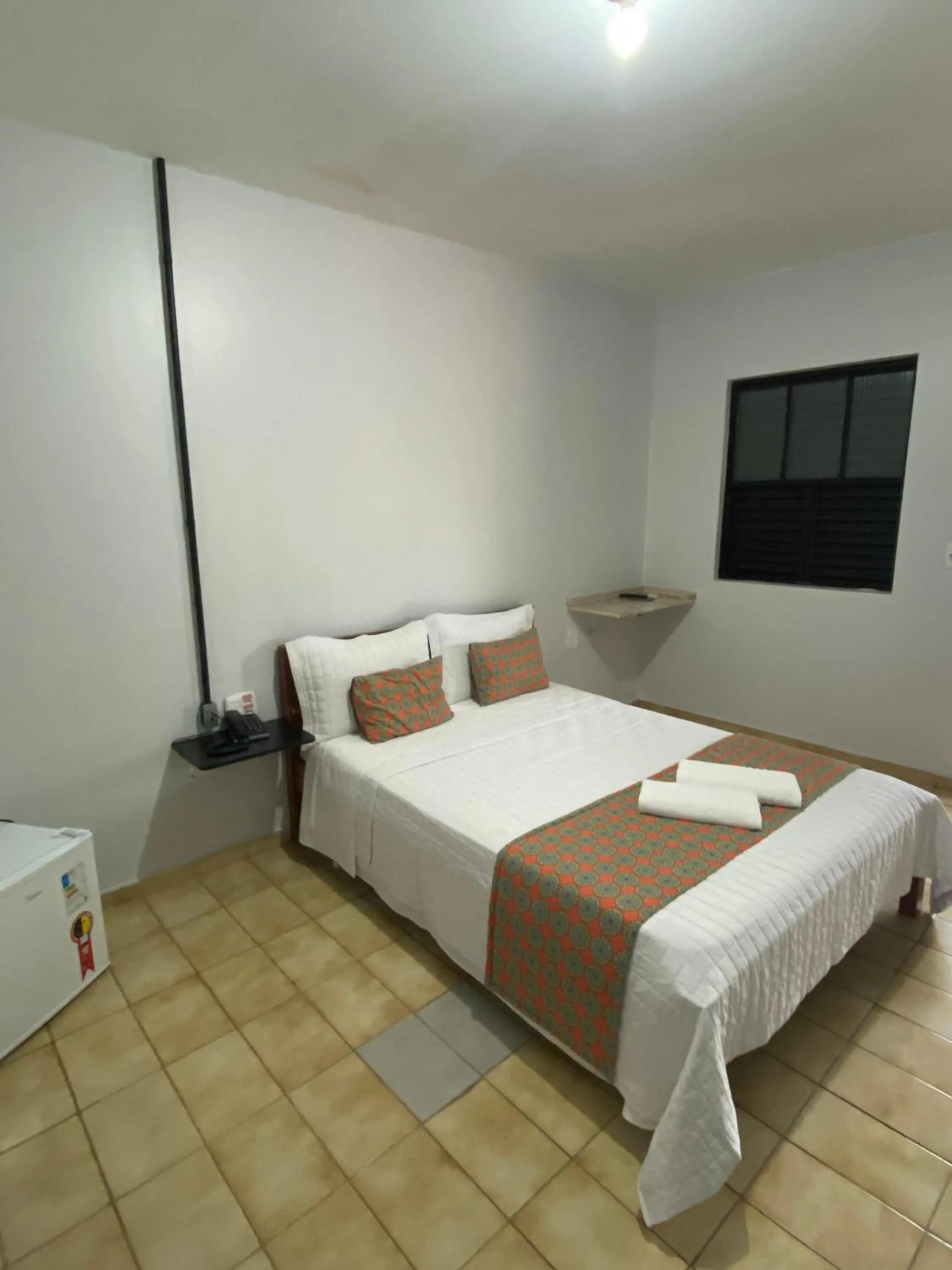 Bed in Pousada Aguas Quentes