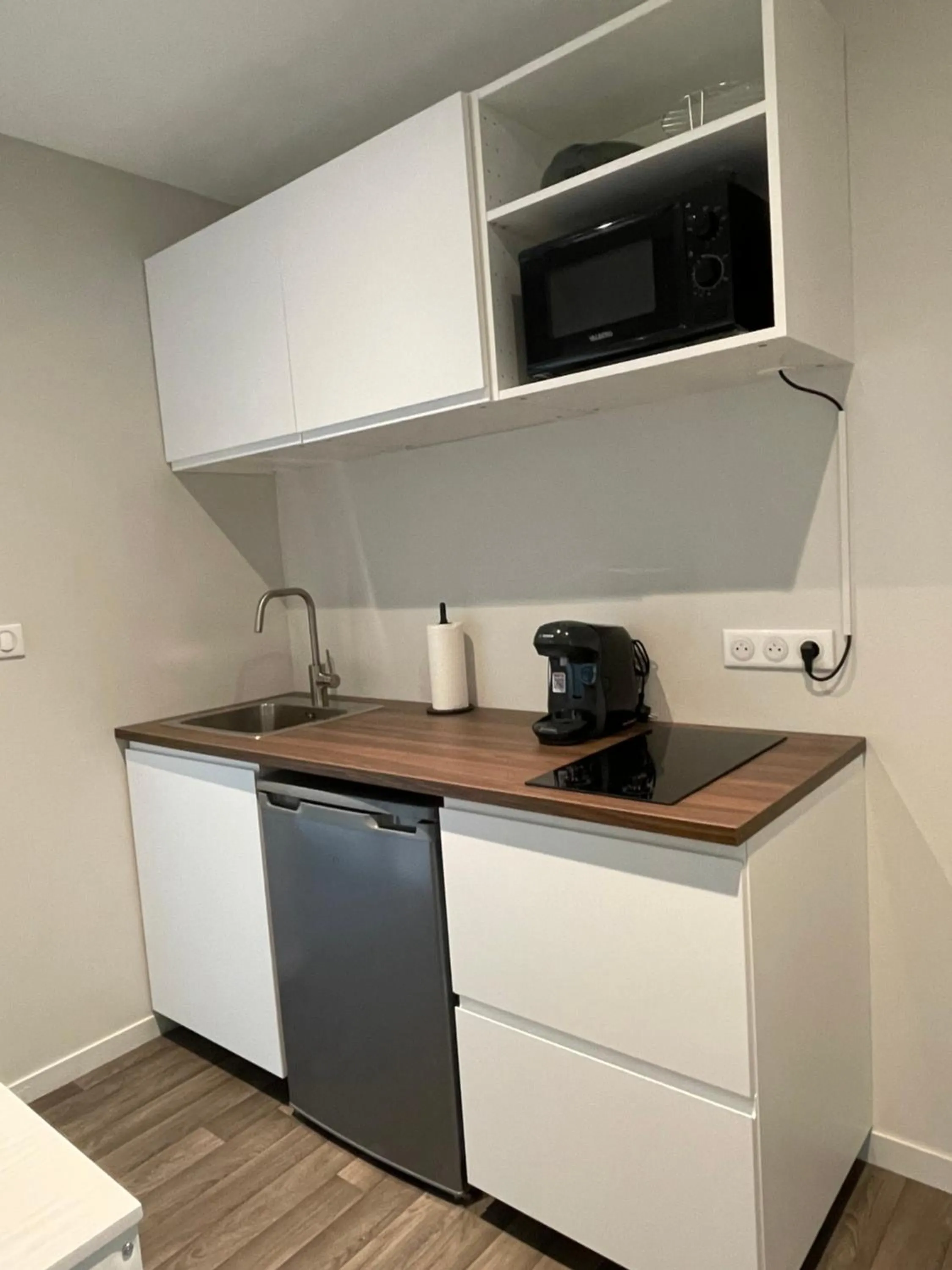 Kitchen or kitchenette in Ducey Appart'Hôtel - Les Rivières