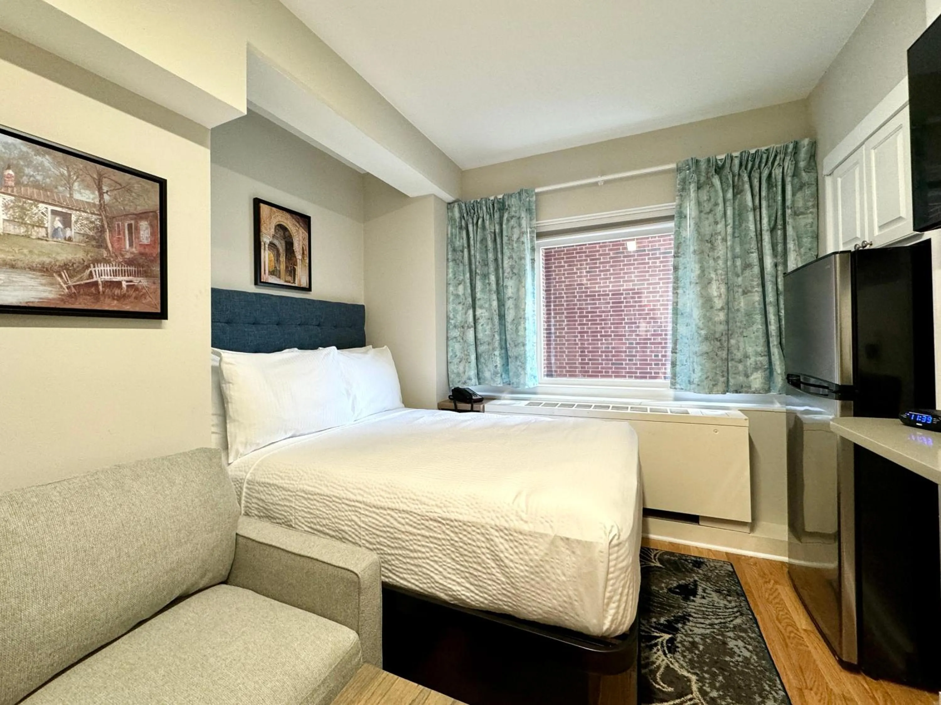 Bed in The GEM Museum Suites