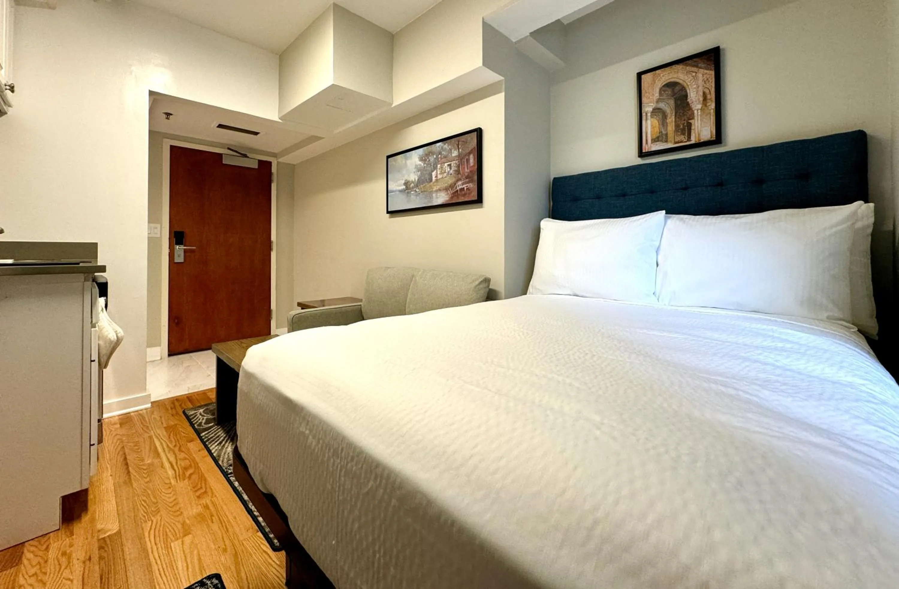 Bed in The GEM Museum Suites