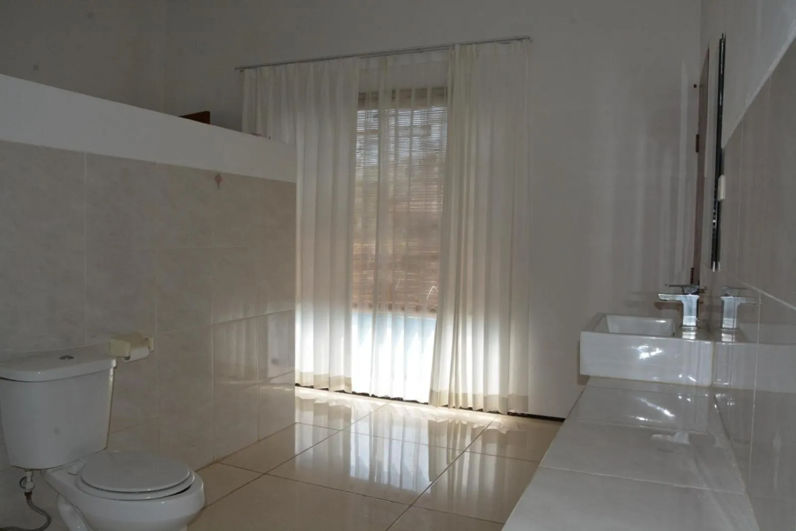 Bathroom in Lovina Villa Cinta