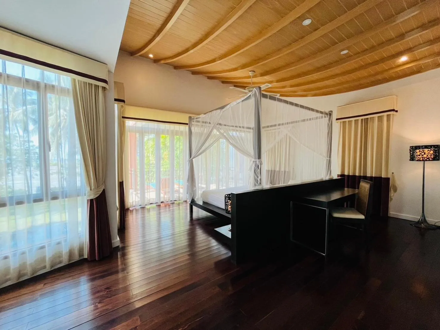 Bedroom in Amatapura Beachfront Villa 12, SHA Certified