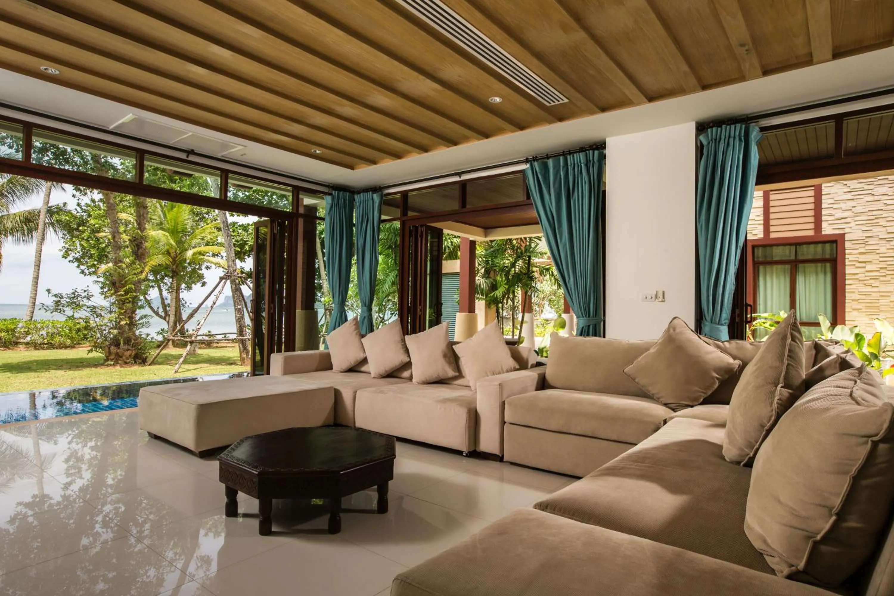 Living room in Amatapura Beachfront Villa 14, SHA Certified