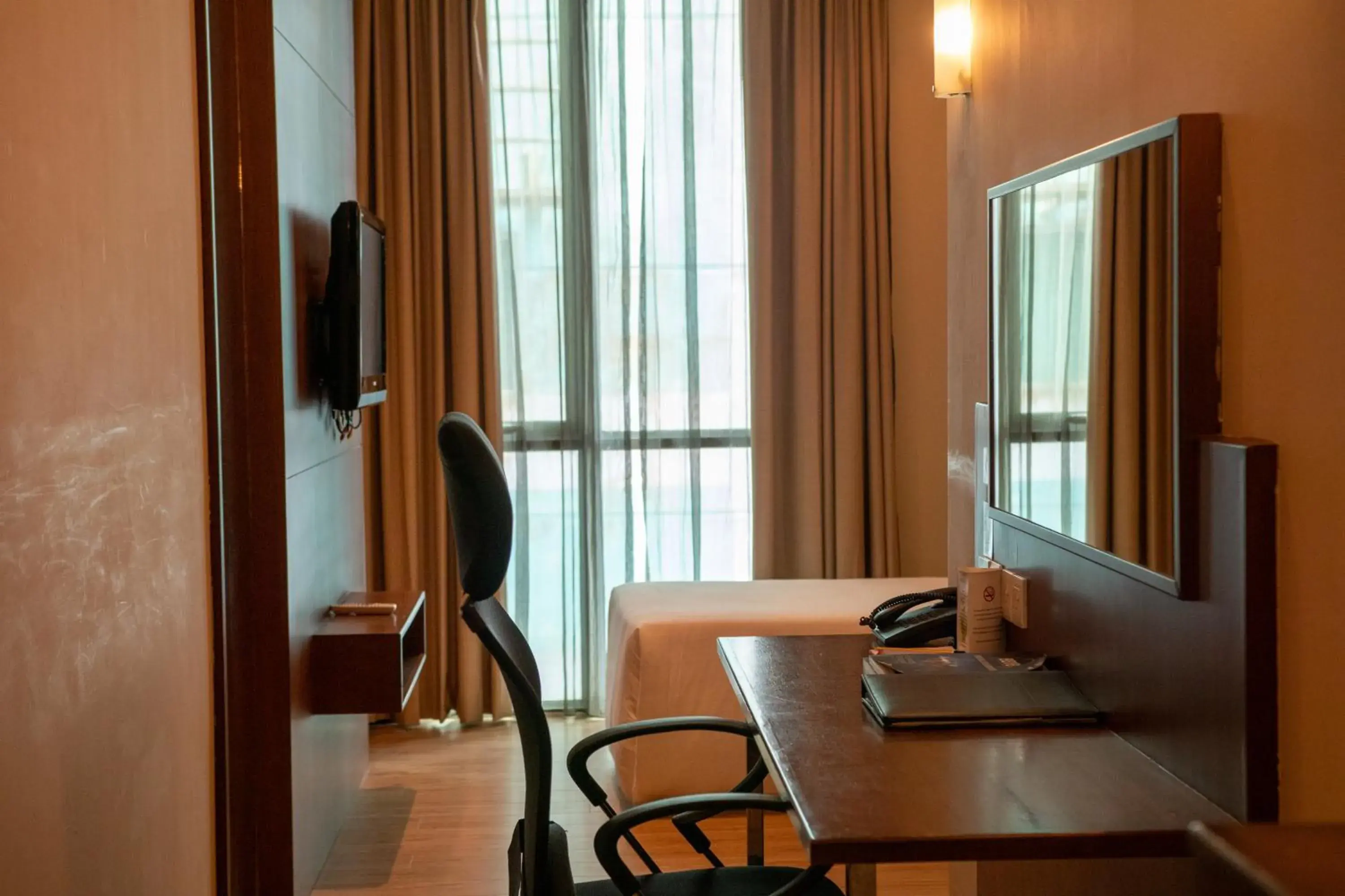 Standard Single Room in Swiss Hotel Apartment Standard Single Room in Swiss Hotel Apartment