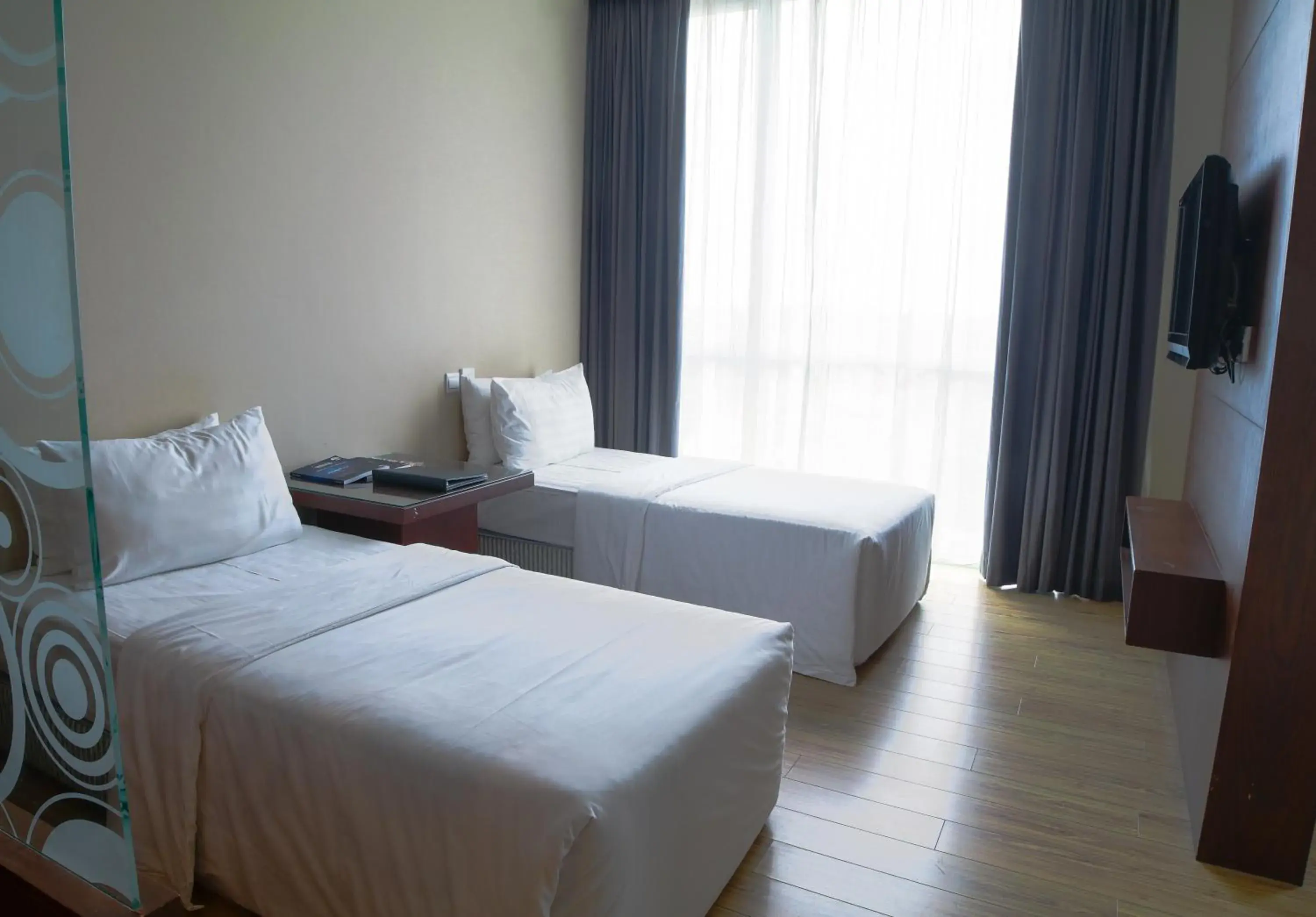 Standard Triple Room in Swiss Hotel Apartment Standard Triple Room in Swiss Hotel Apartment