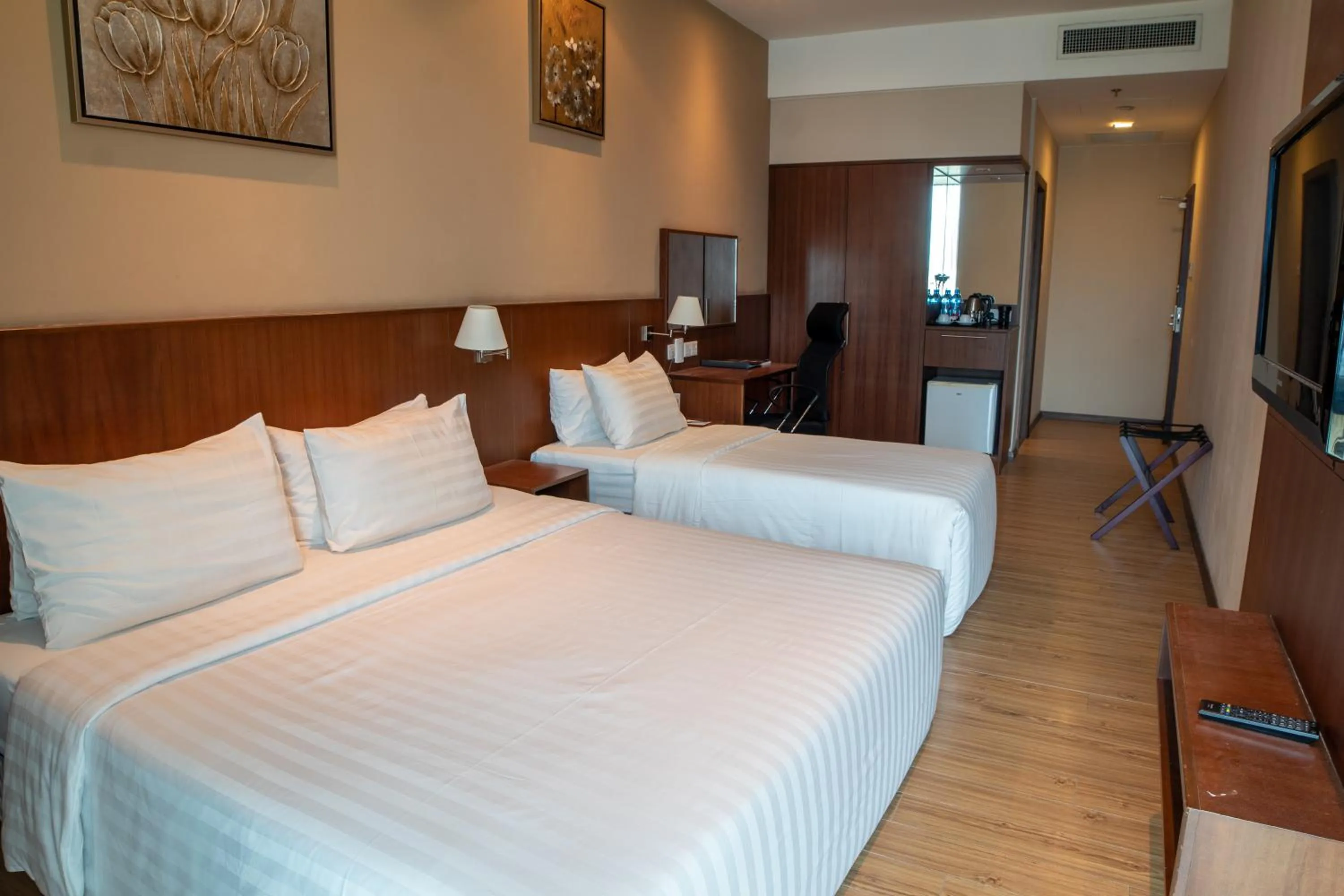 Bed in Swiss Hotel Apartment