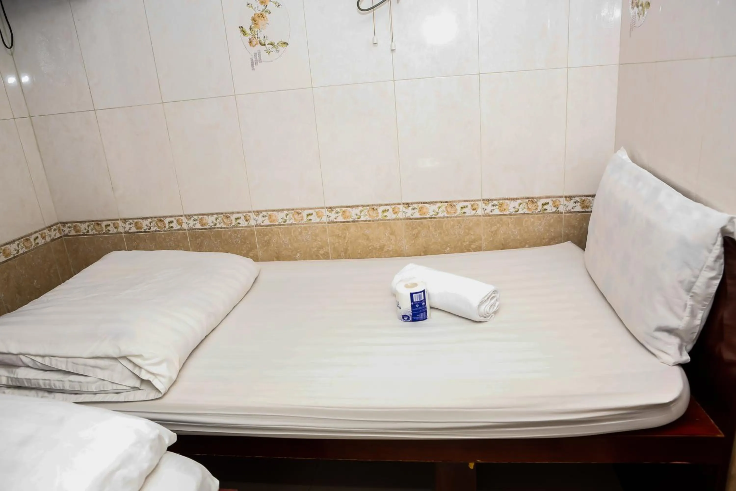 Bed in New Guangzhou Guest House