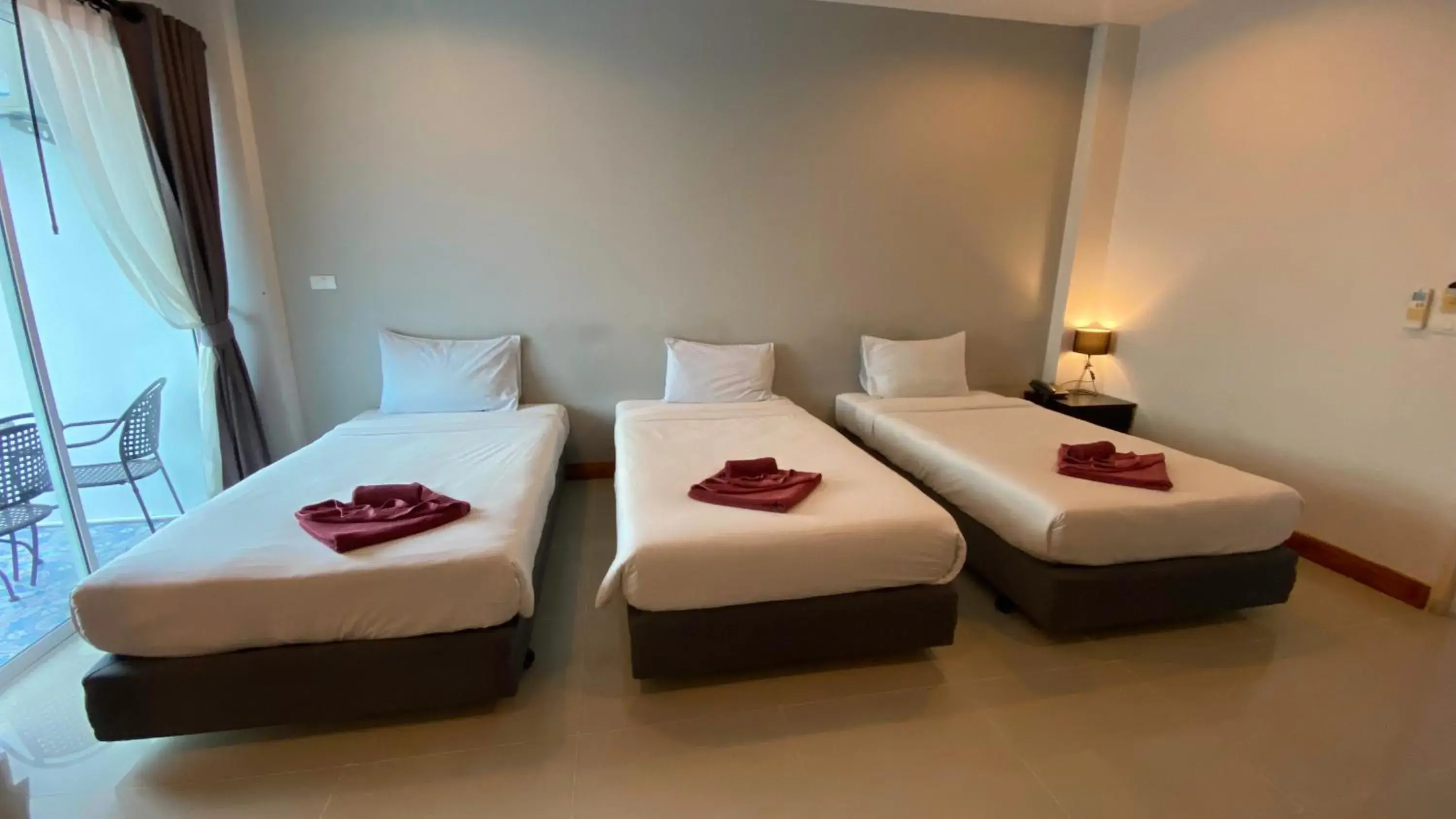 Budget Triple Room in Karon Sea Side Budget Triple Room in Karon Sea Side