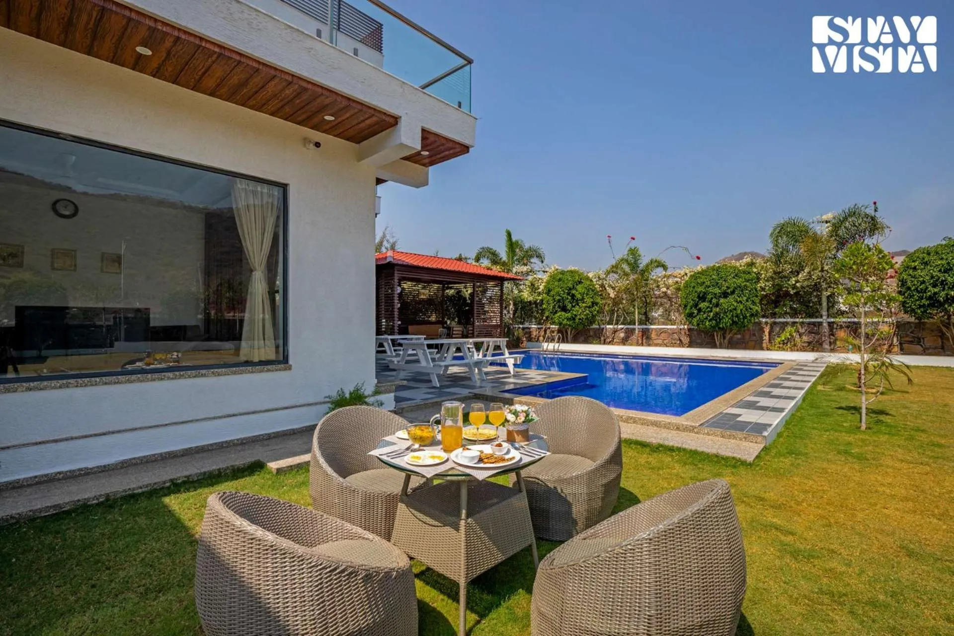 Garden in StayVista's Bella Dream - Mountain-View with Outdoor Pool, Lawn featuring a Gazebo & Indoor Games