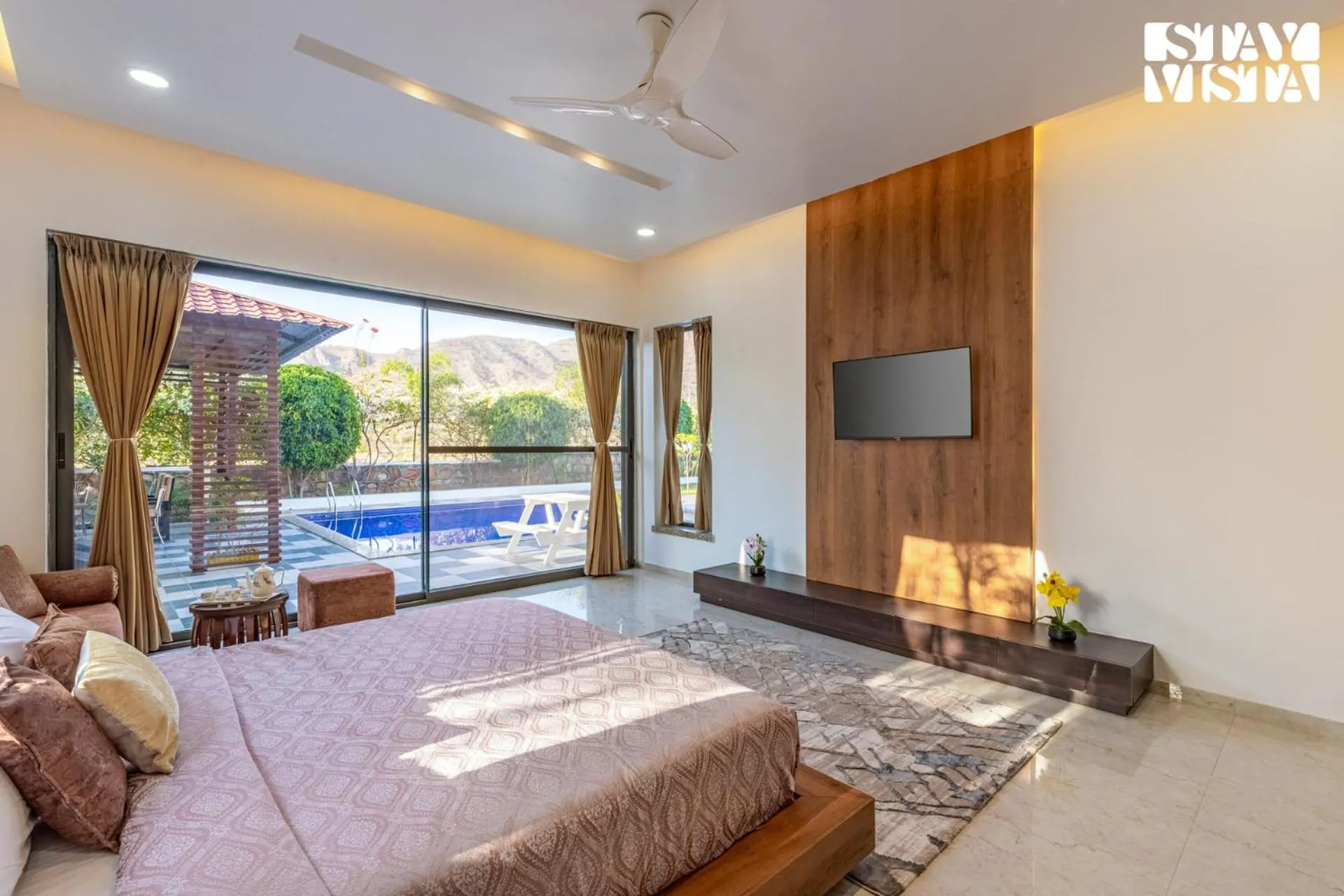 Bedroom, Bed in StayVista's Bella Dream - Mountain-View with Outdoor Pool, Lawn featuring a Gazebo & Indoor Games