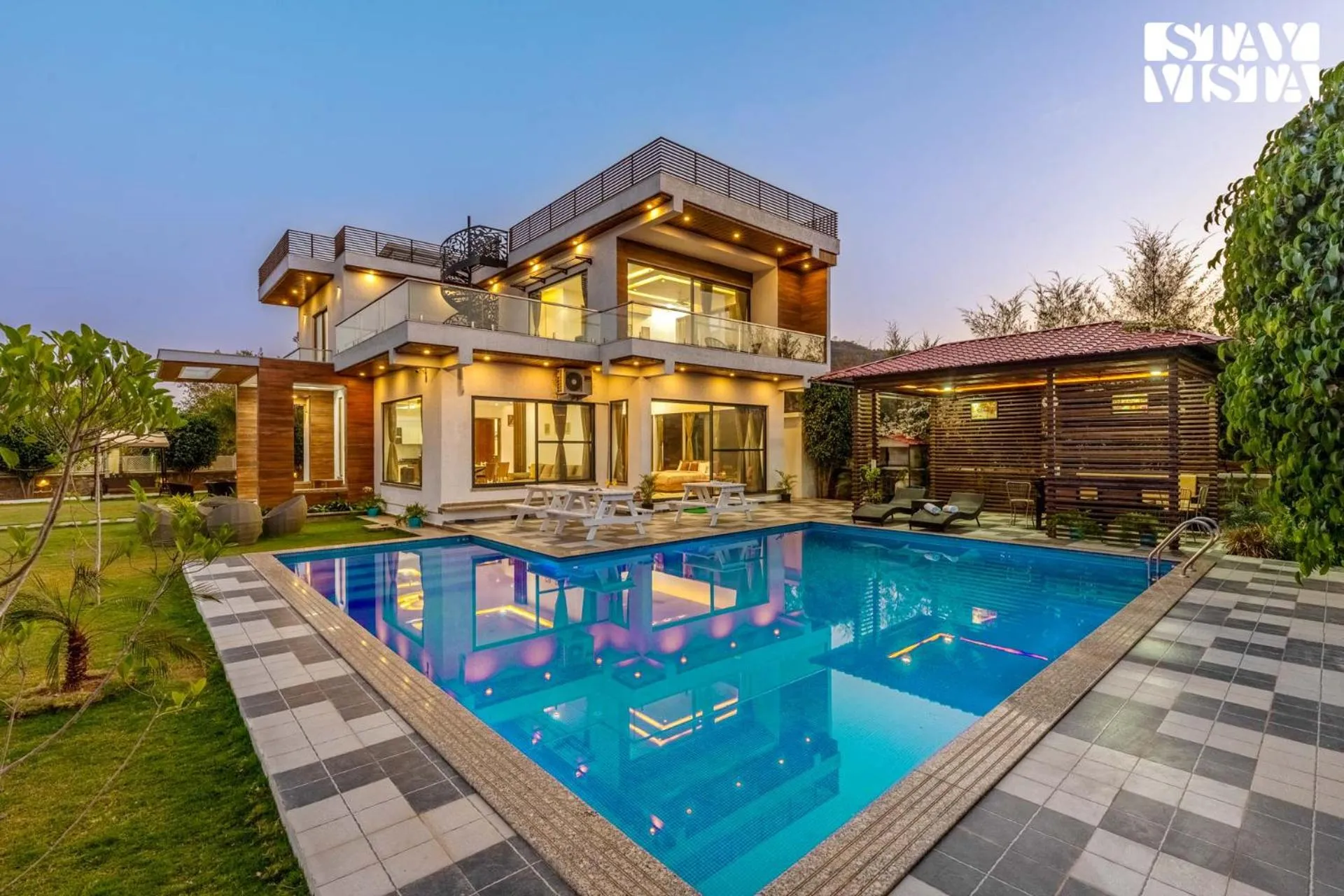 Property building in StayVista's Bella Dream - Mountain-View with Outdoor Pool, Lawn featuring a Gazebo & Indoor Games