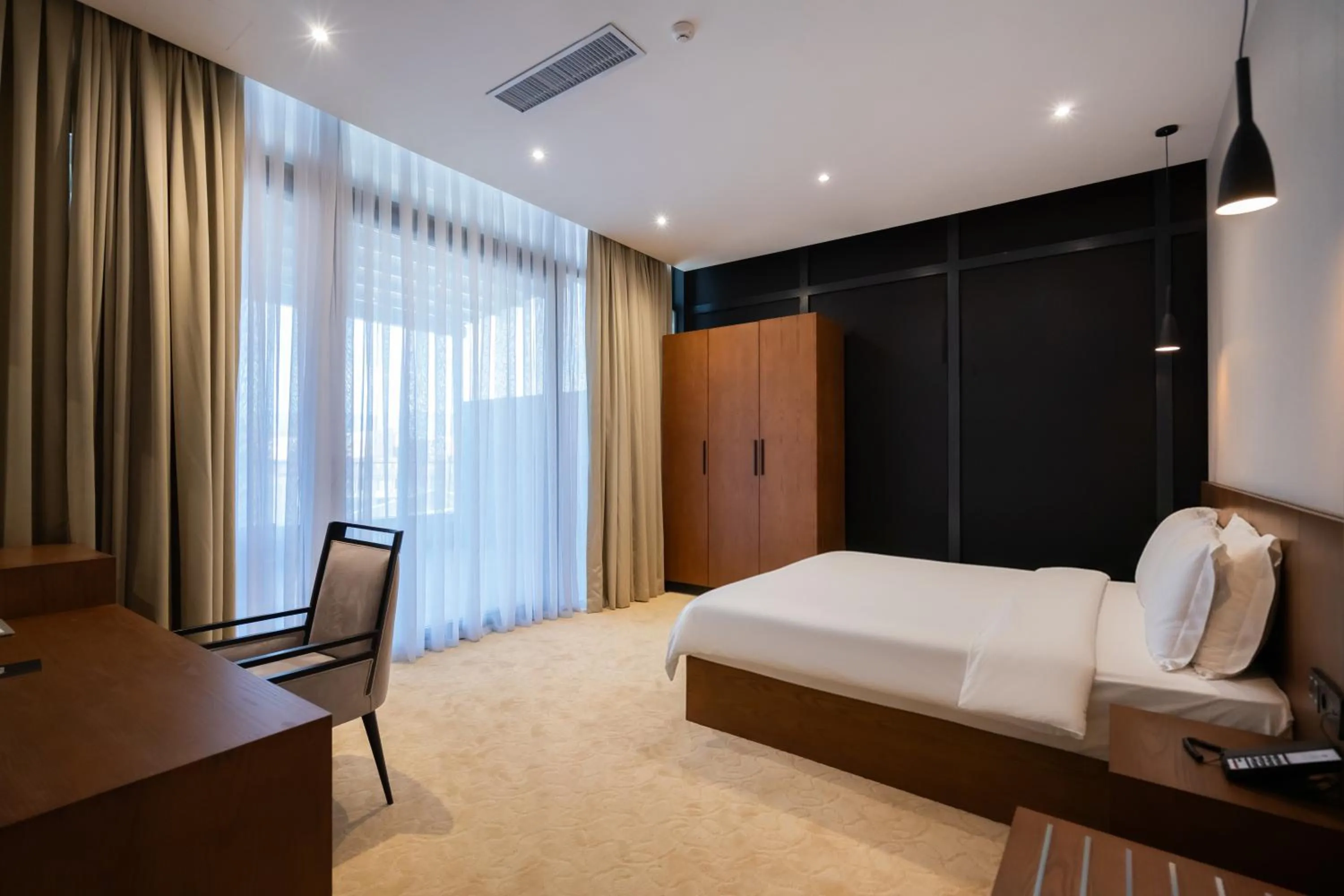 Bed in Bushi Resort & SPA