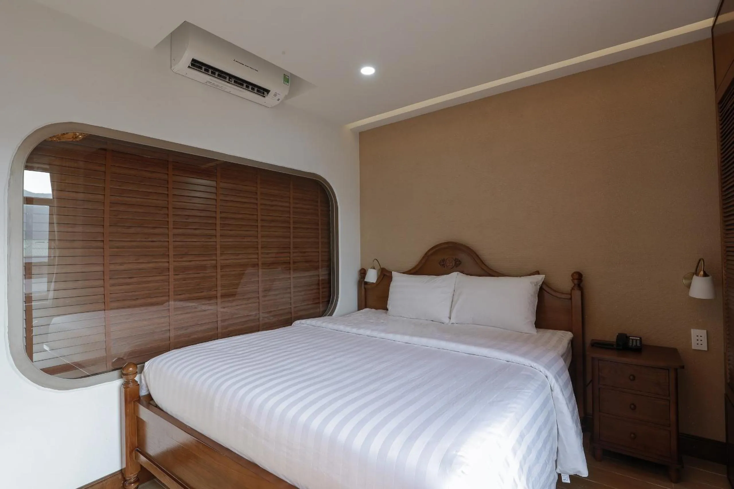 Bed in Maya Hotel 4