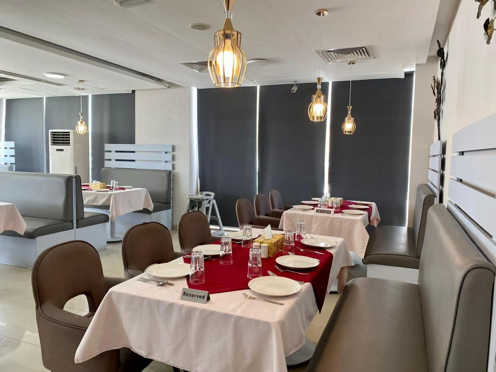 Dining area in Savoy Grand Hotel Apartments
