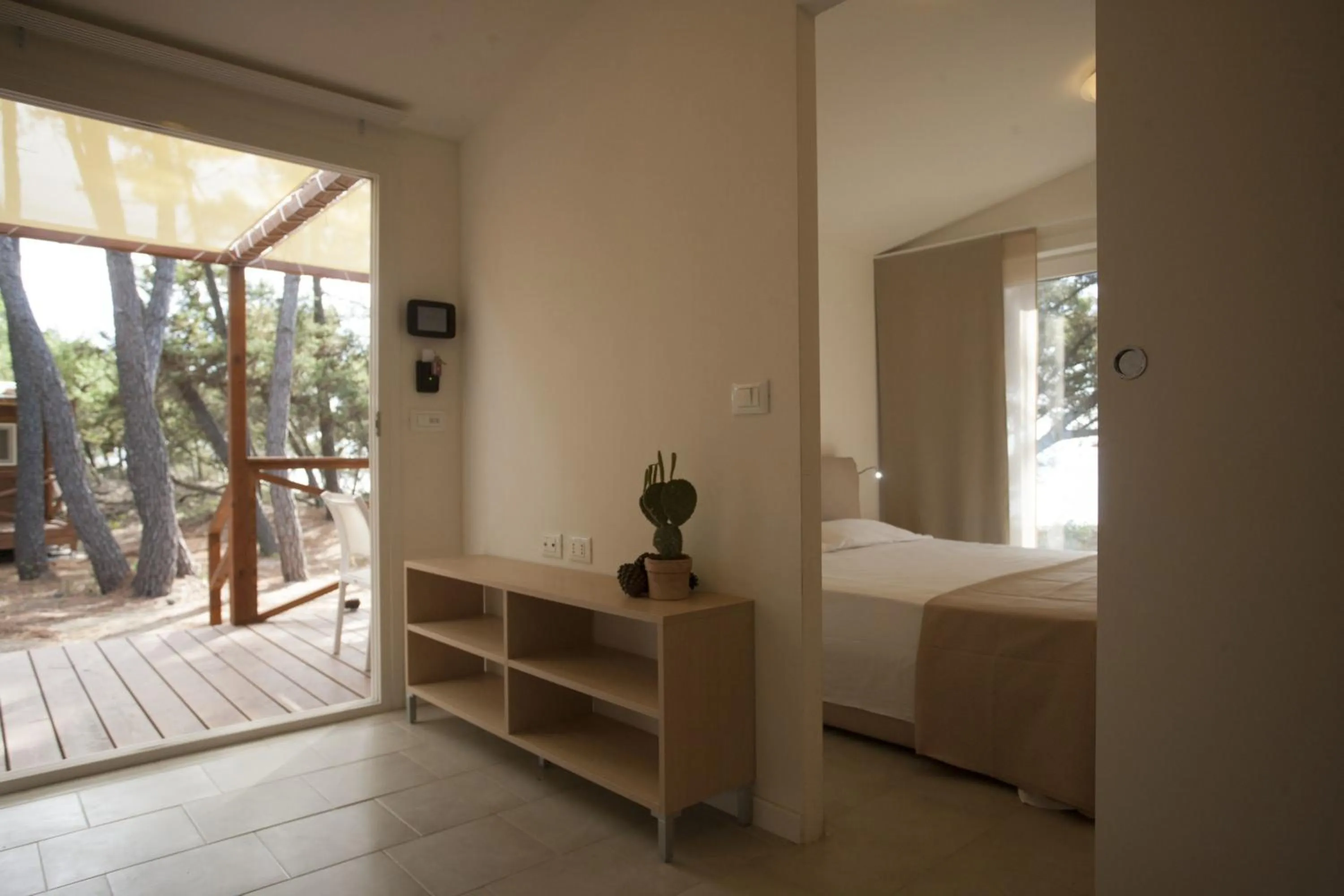 Living room, Bed in PuntAla Camp & Resort