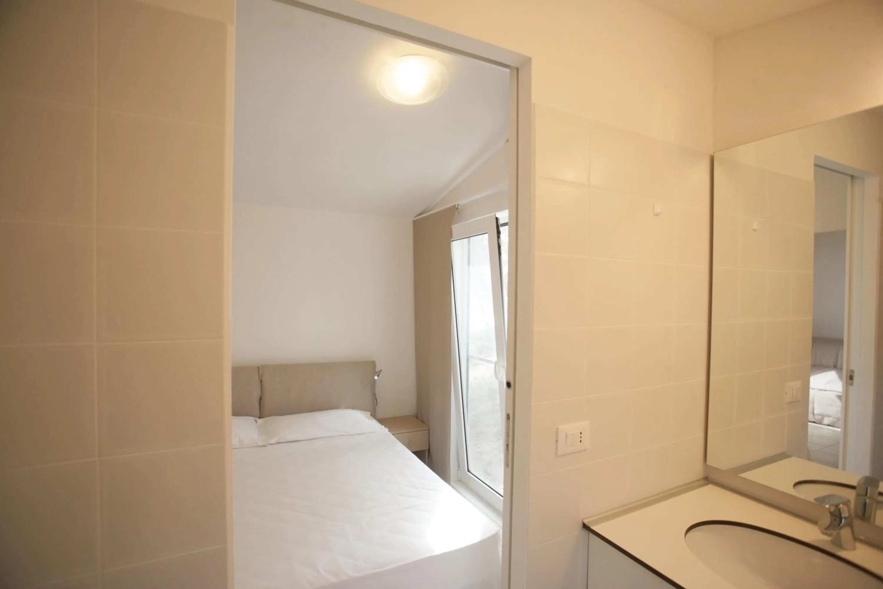 Day, Bed in PuntAla Camp & Resort