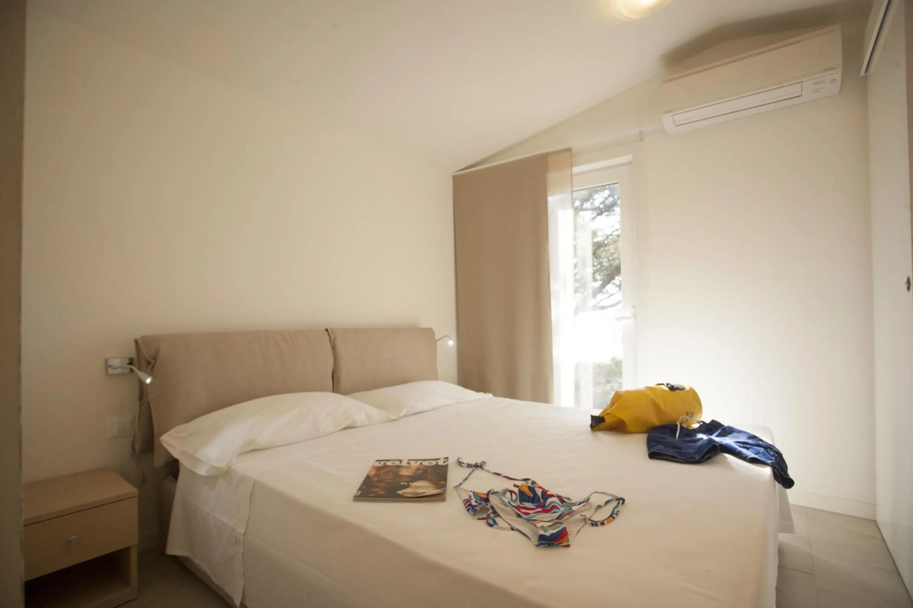 Bed in PuntAla Camp & Resort