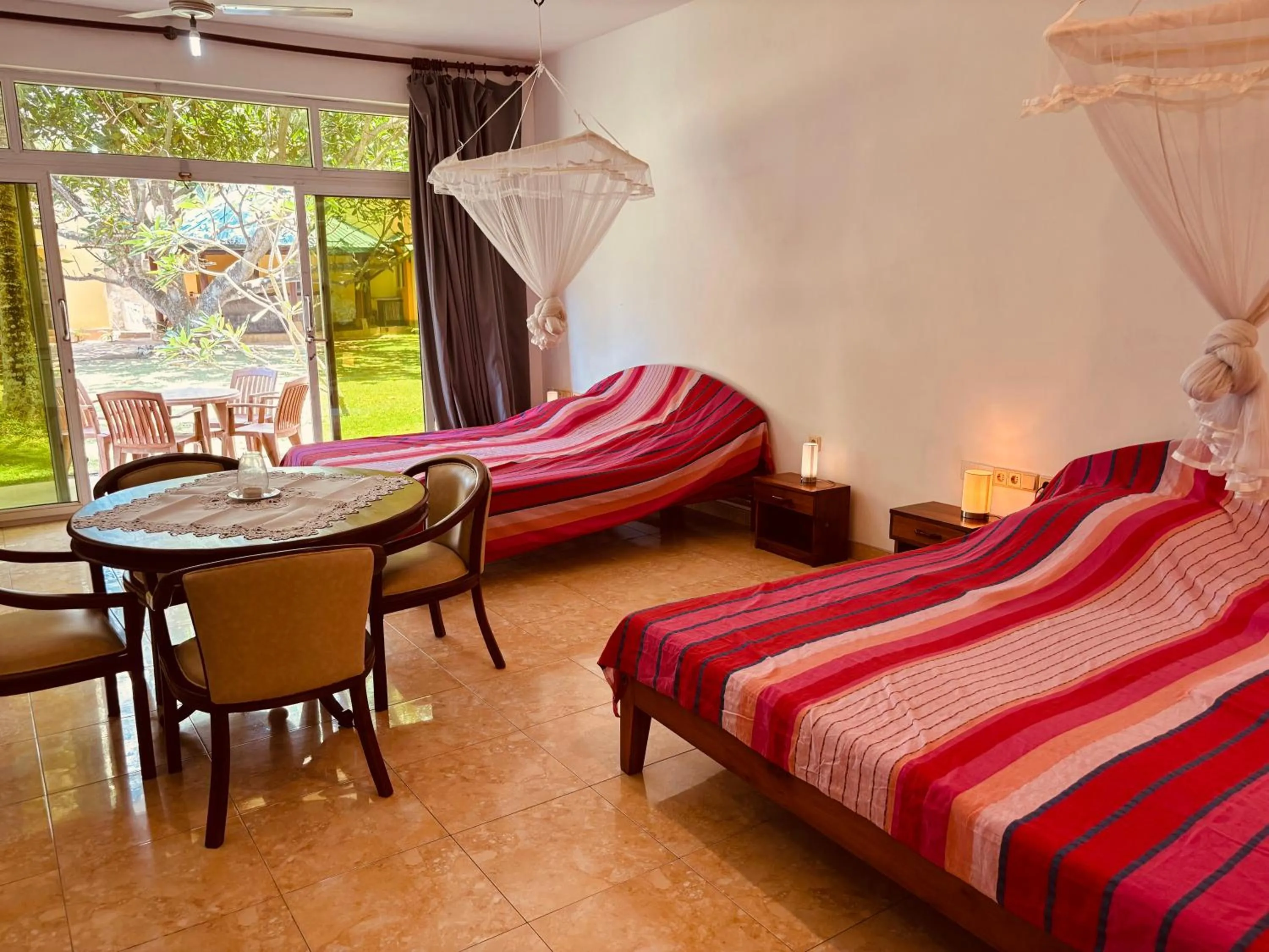 Photo of the whole room, Bed in Raja Beach Hotel