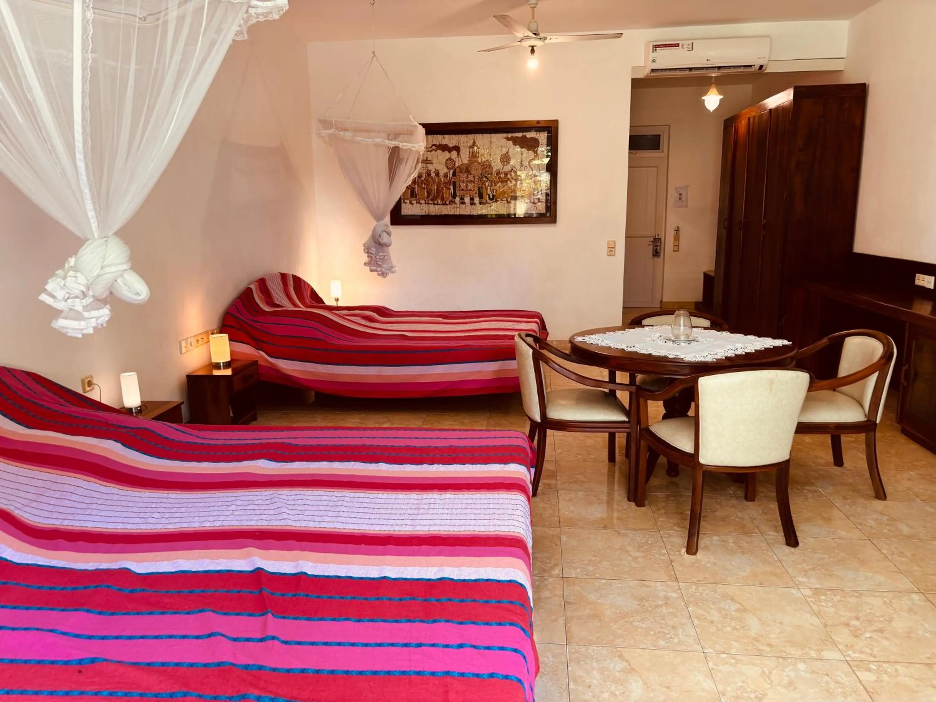 Photo of the whole room, Bed in Raja Beach Hotel